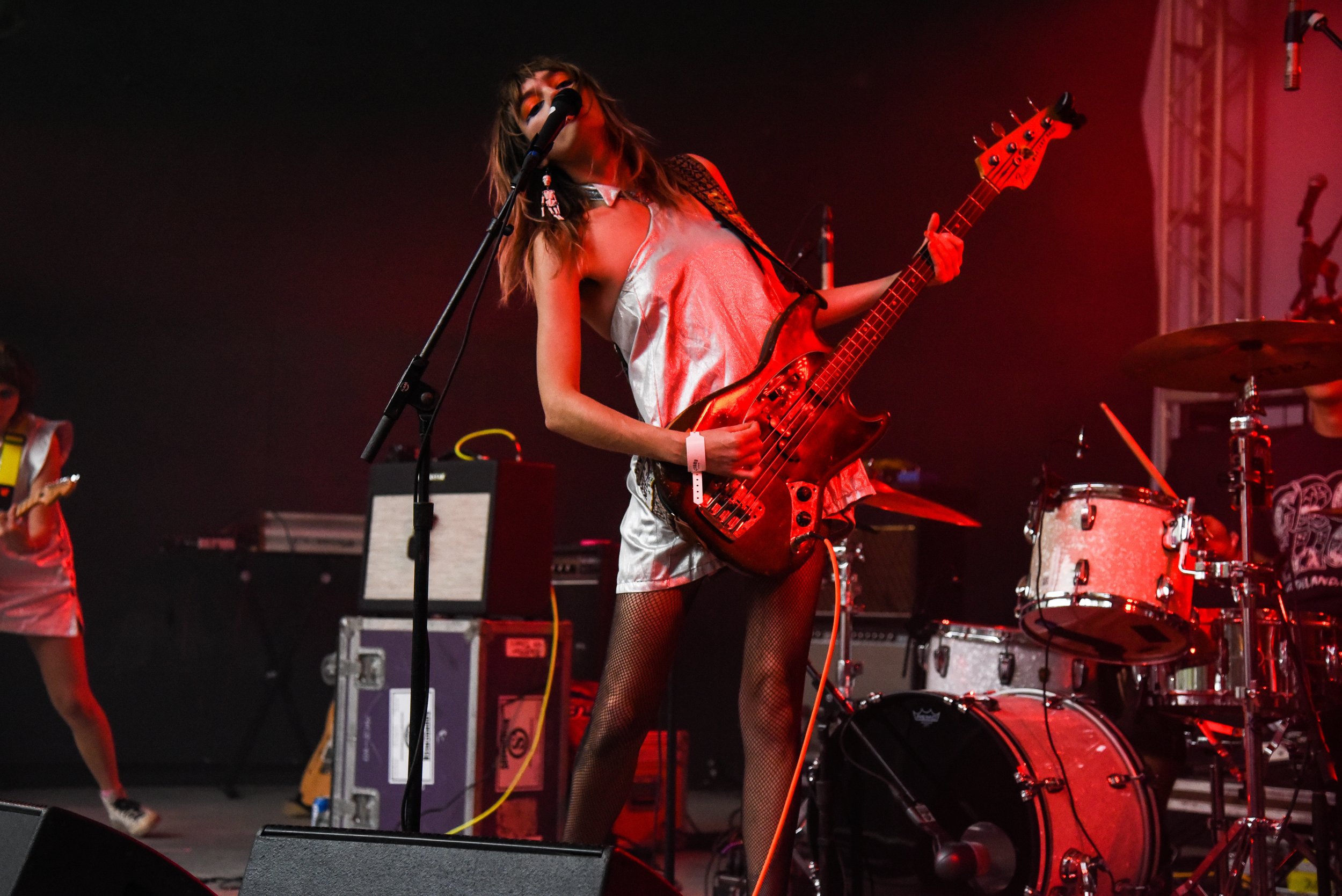  Staz Lindsy bends backwards as she shreds on her guitar. 