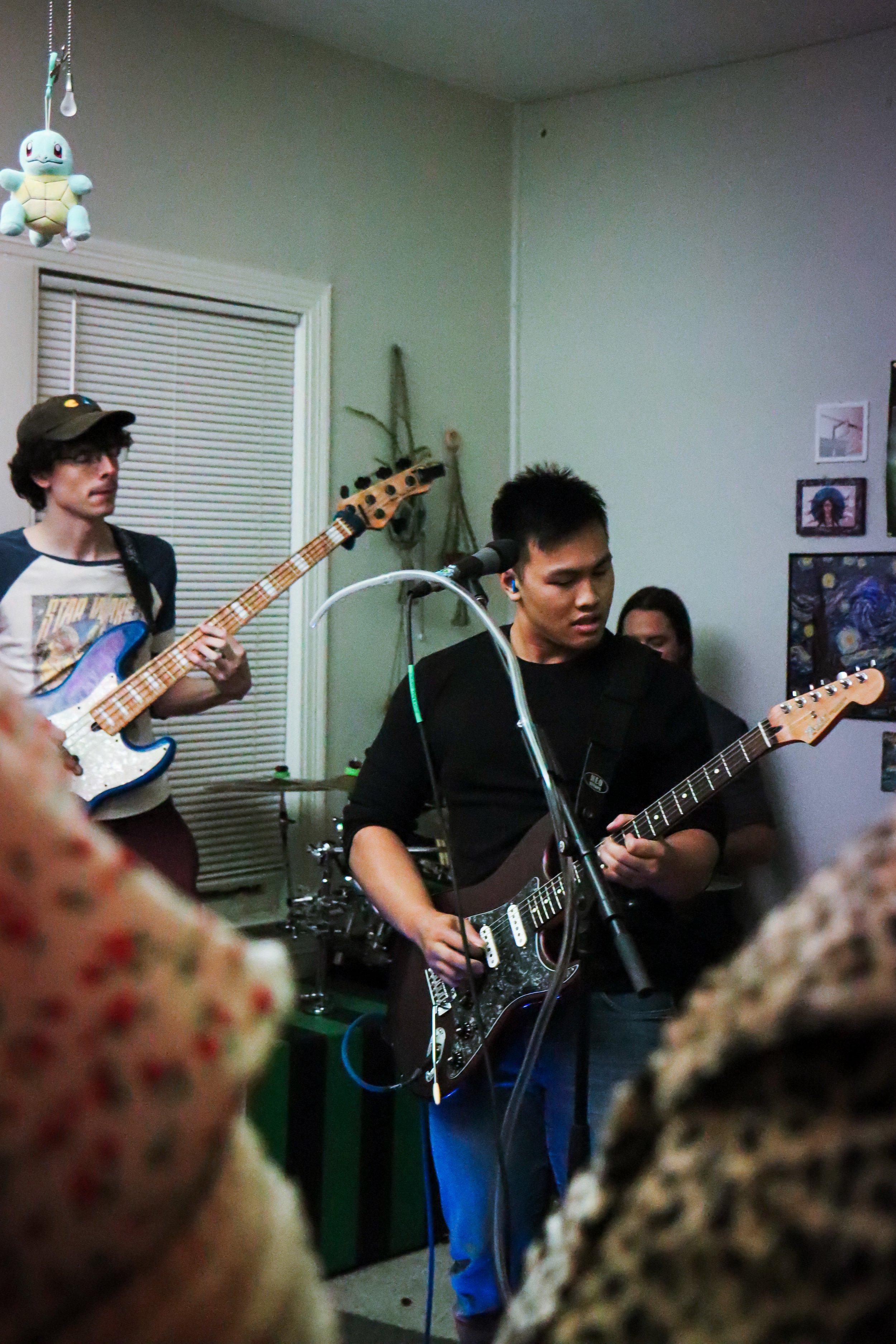  Blue Tongue performs its set at the Afterglow House Show.  Photo by Natalie Anspach  