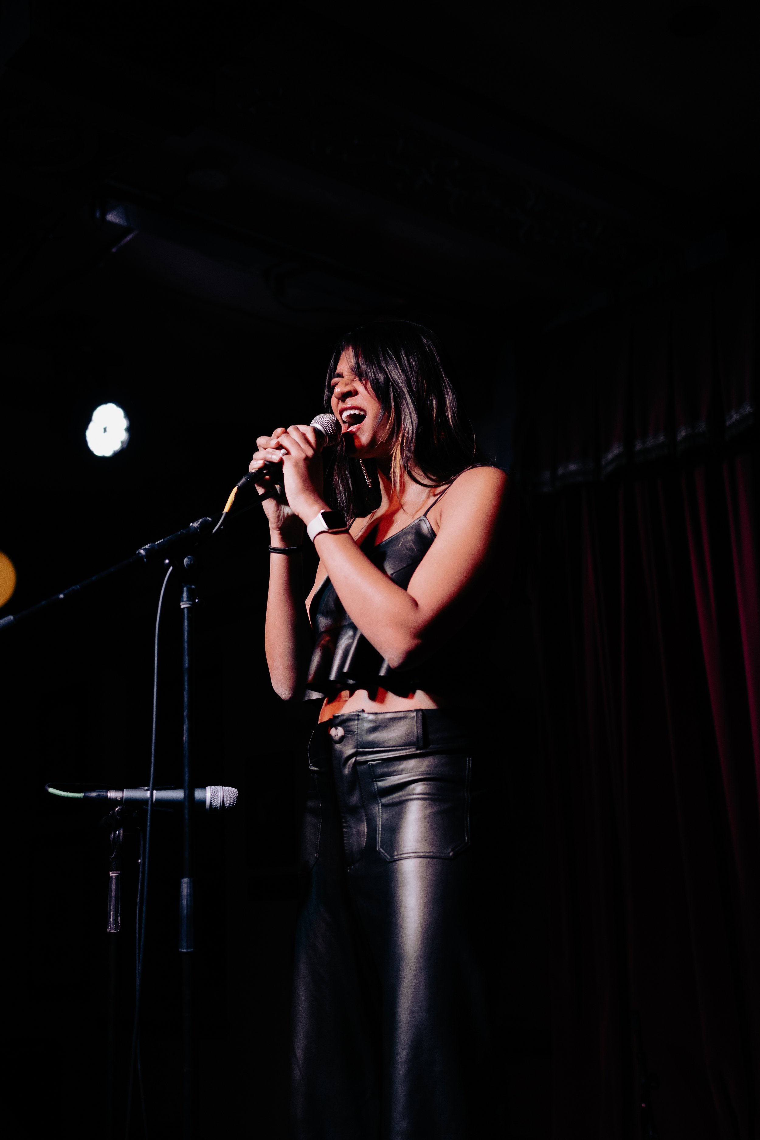 Avara belts out an unreleased, self-produced song.  Photo by Amelia Tapia  