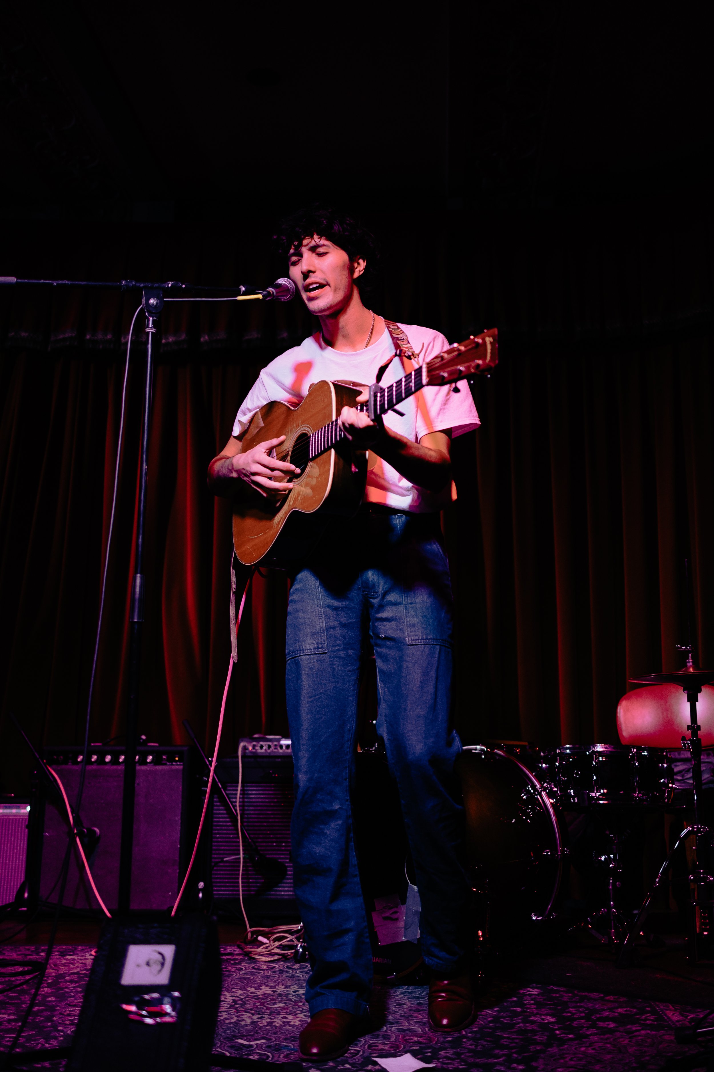  Lefty Parker sings wistfully into the microphone.  Photo by Amelia Tapia  