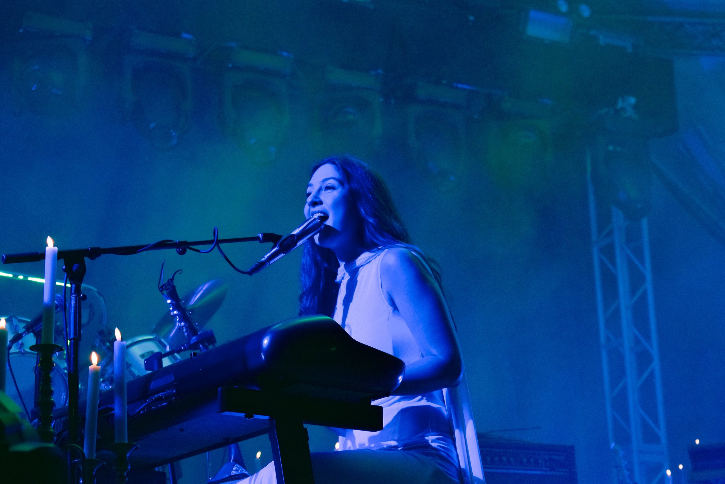  Weyes Blood moves to the piano to perform “Everyday.” Before she starts, she suggests the crowd mosh to the melodramatic piece. 