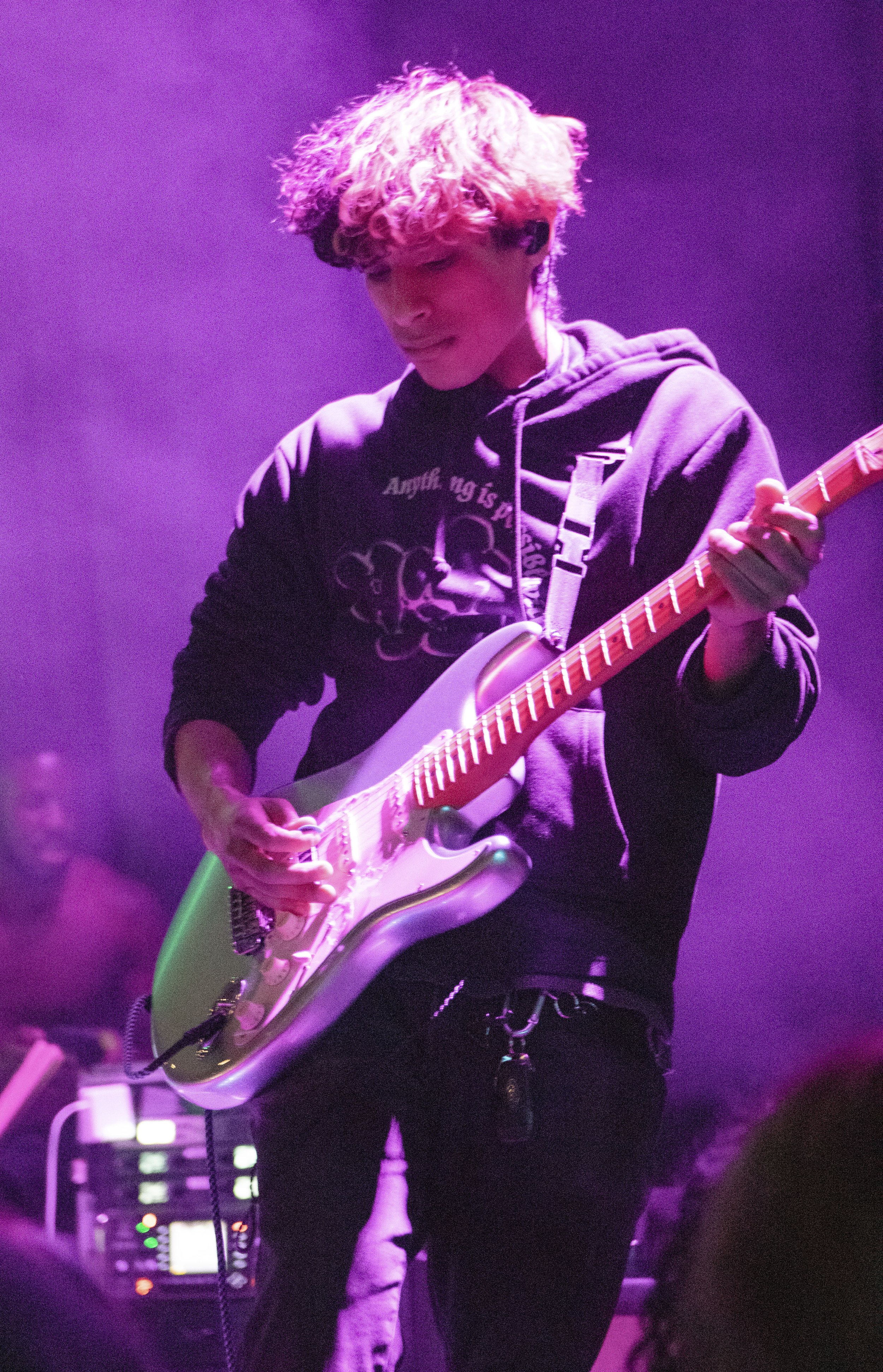  Freddie Criales, lead guitarist of Magnolia Park, skillfully plays his guitar. 
