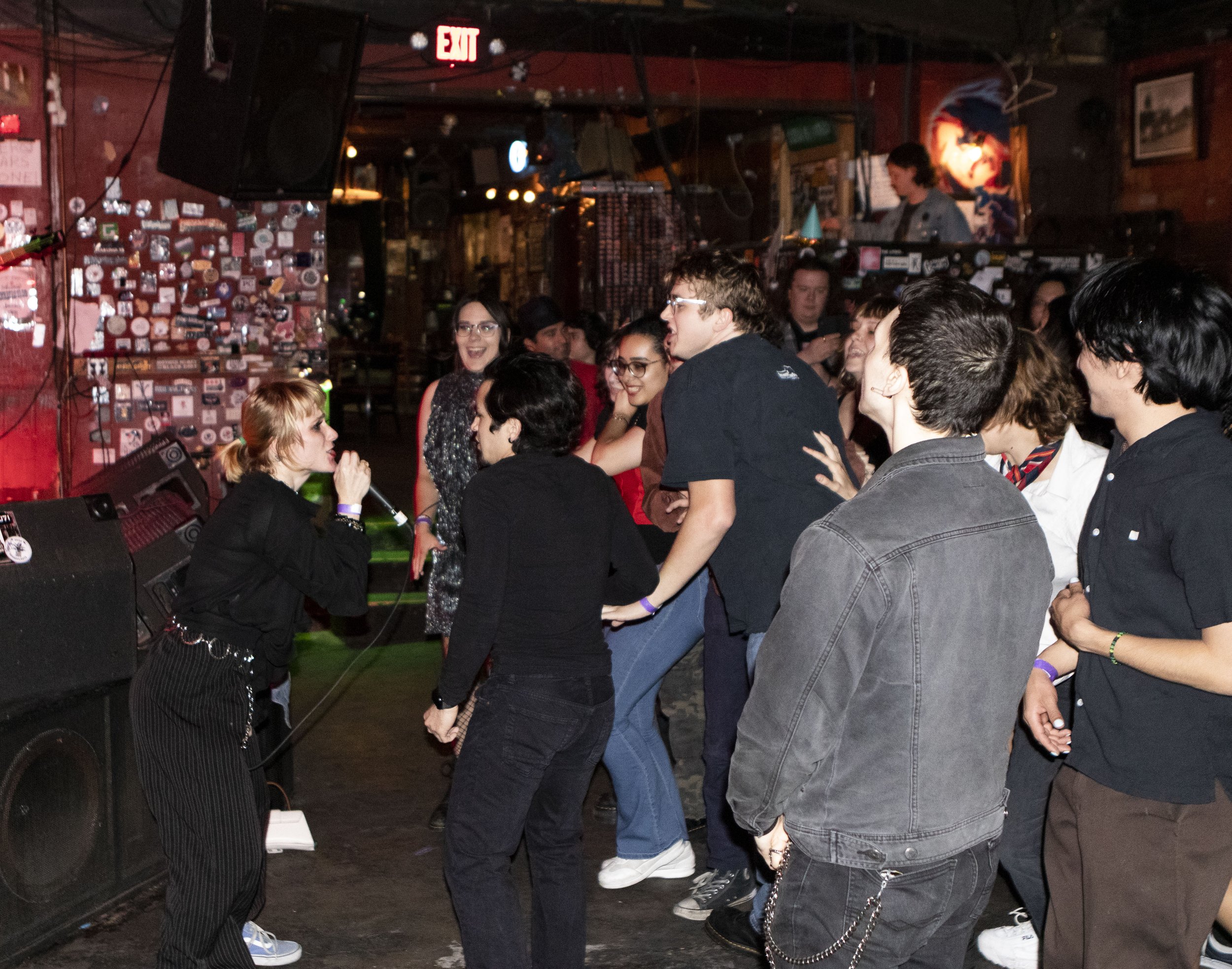  The crowd opens up a mosh pit as the lead singer of Not Safe For Who joins the crowd on the floor to sing the band’s last song.  Photo by Shefali Rao  