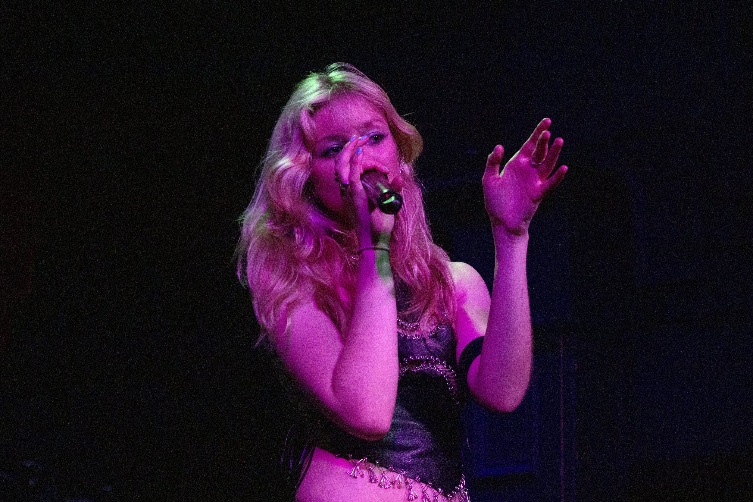  Dylan looks out to the crowd as she performs songs from her three most recent albums. 