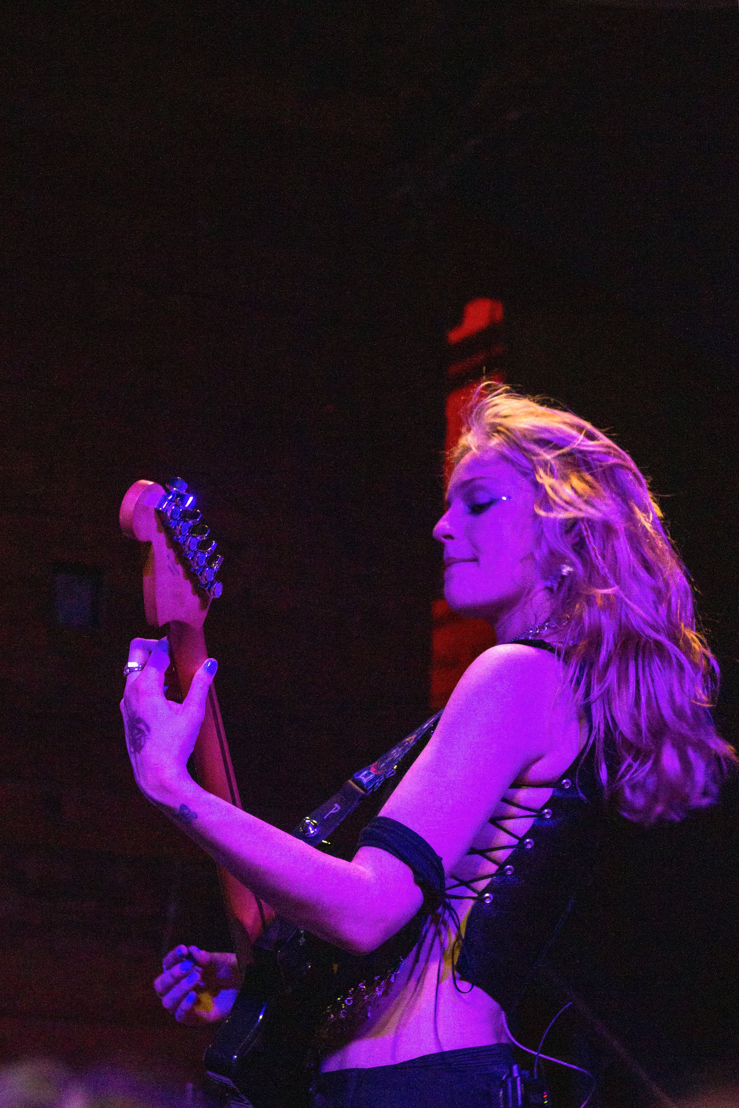  Dylan shreds the guitar onstage. 