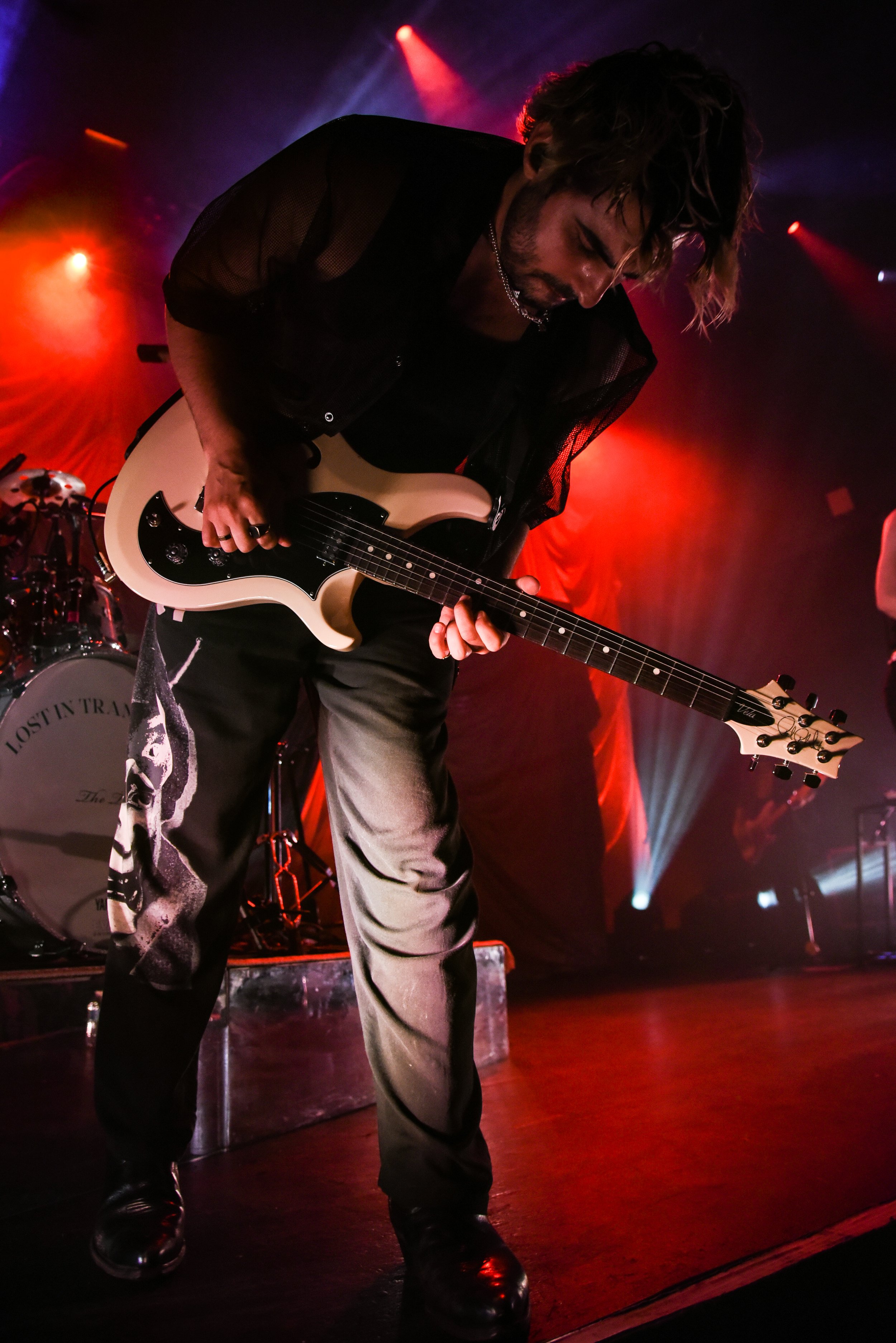  Guitarist Michael "Mickey" Brandolino shreds his guitar on stage. 