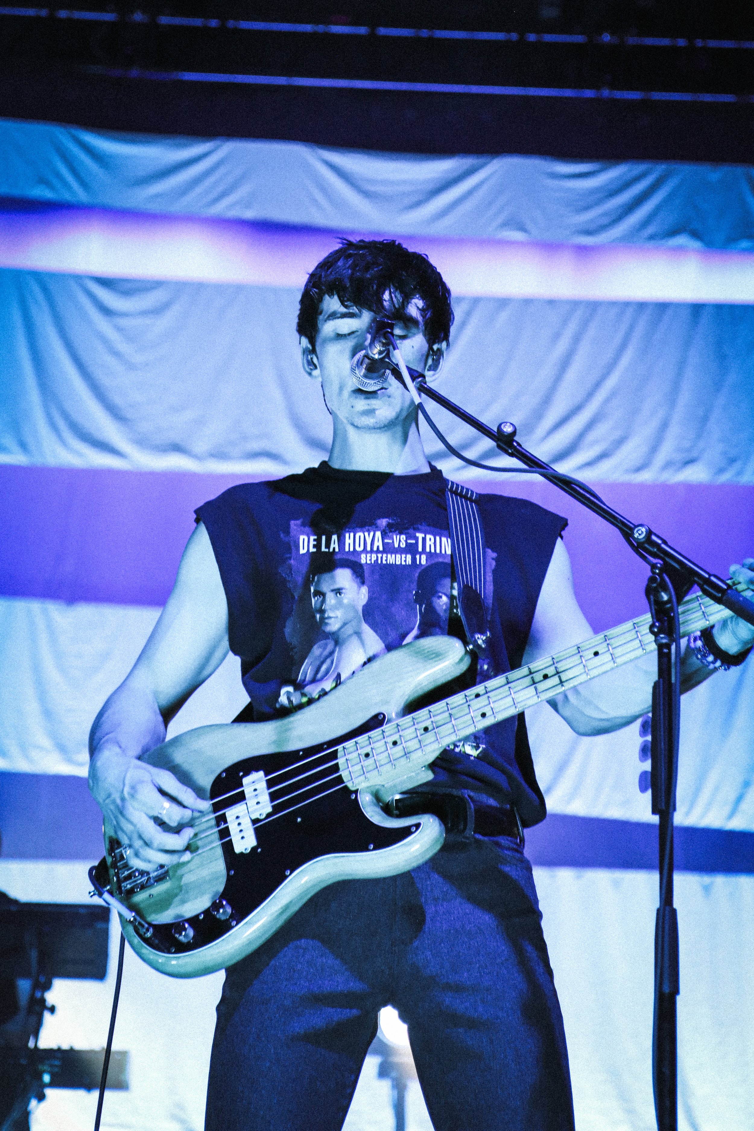  Bassist Zack Sutton of Hippo Campus sings along.  