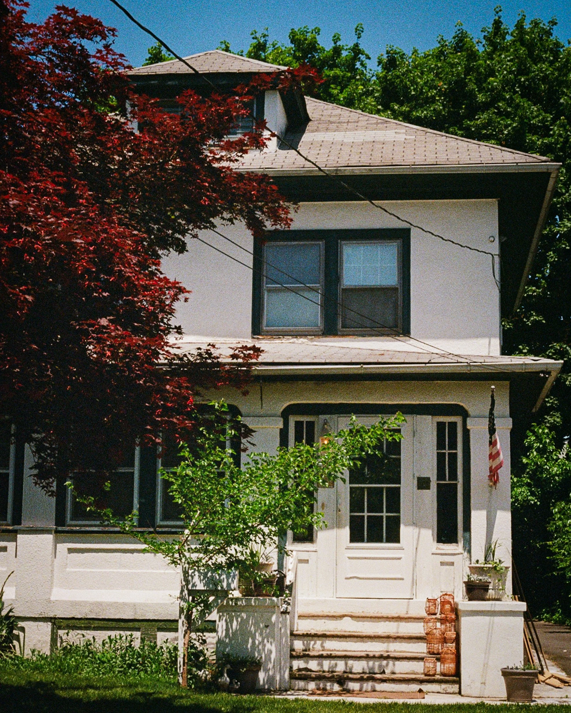    “And my house was designed to kinda look like it’s crying / The eyes are the windows, the garage is the mouth”   Unique historic houses and towns, like this one in Boonton, New Jersey, contribute to the New England charm. While these locations are