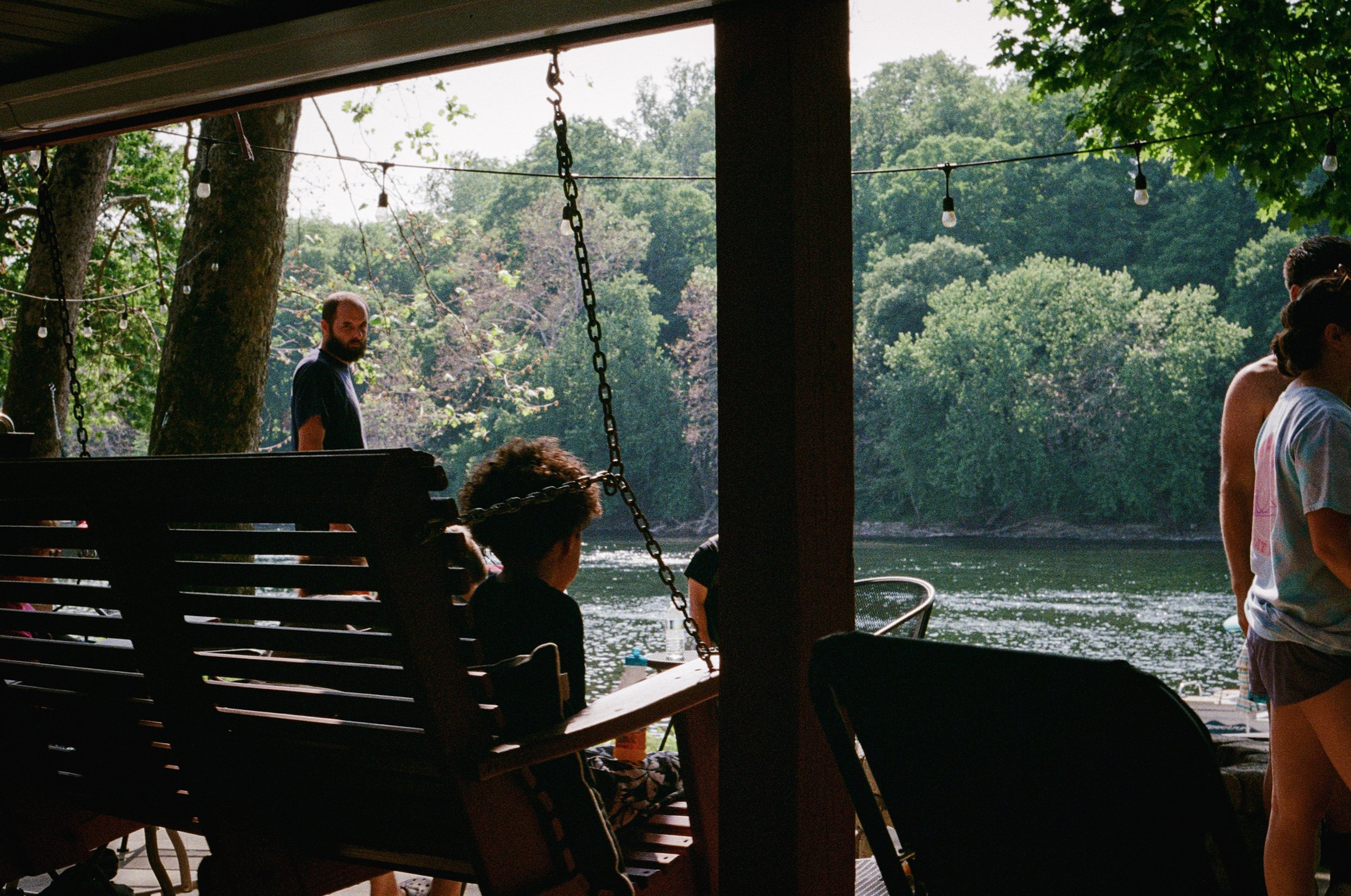    “This place had a heartbeat in its day”   I paired this photo of a family gathering on an old boat dock with this line from “Paul Revere” that compares this liveliness to a heartbeat. The high contrast in the photo mimics the high contrast of good