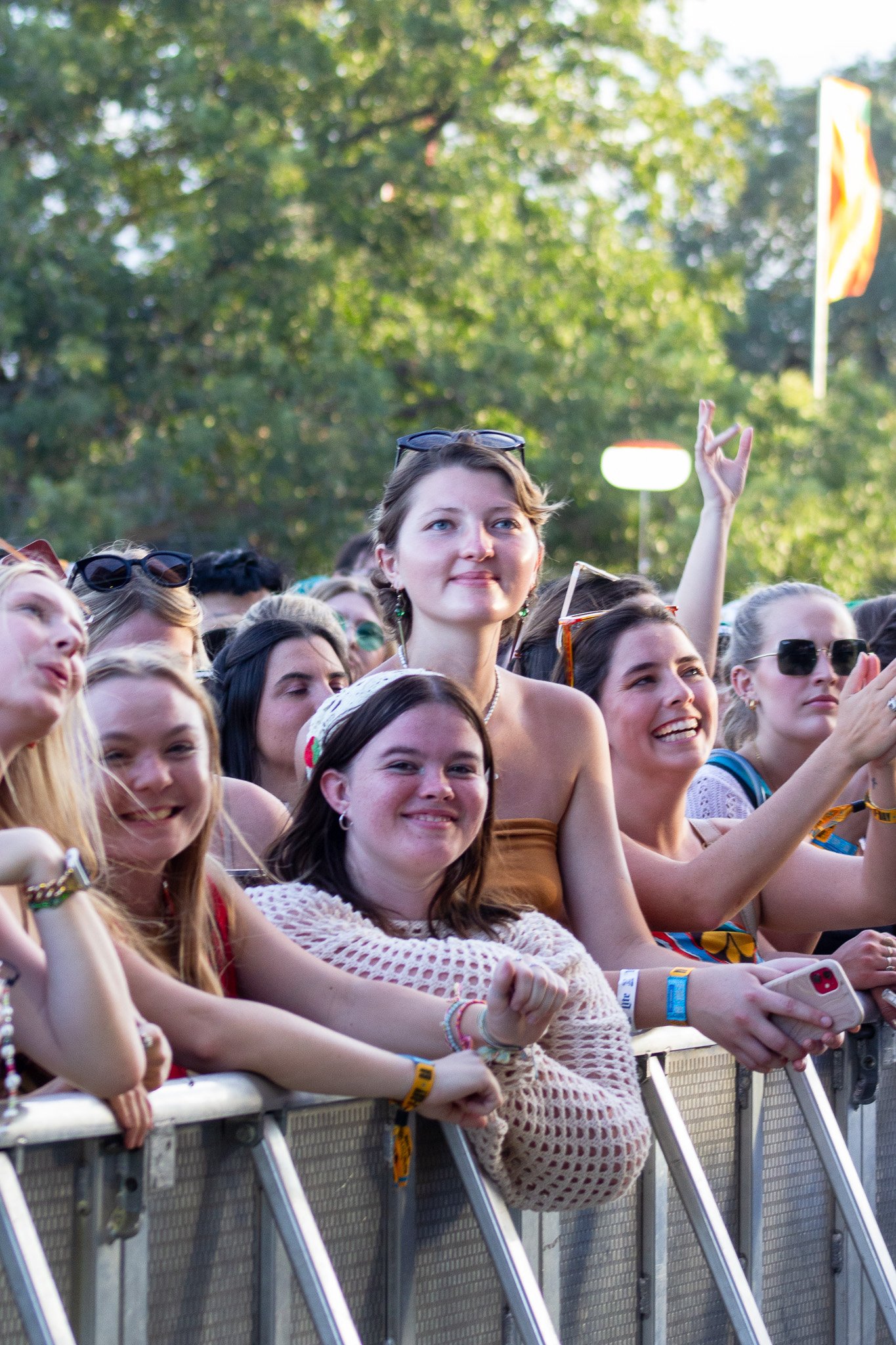  The crowd admires Maggie Rogers as she performs under the setting sun at Zilker Park. 