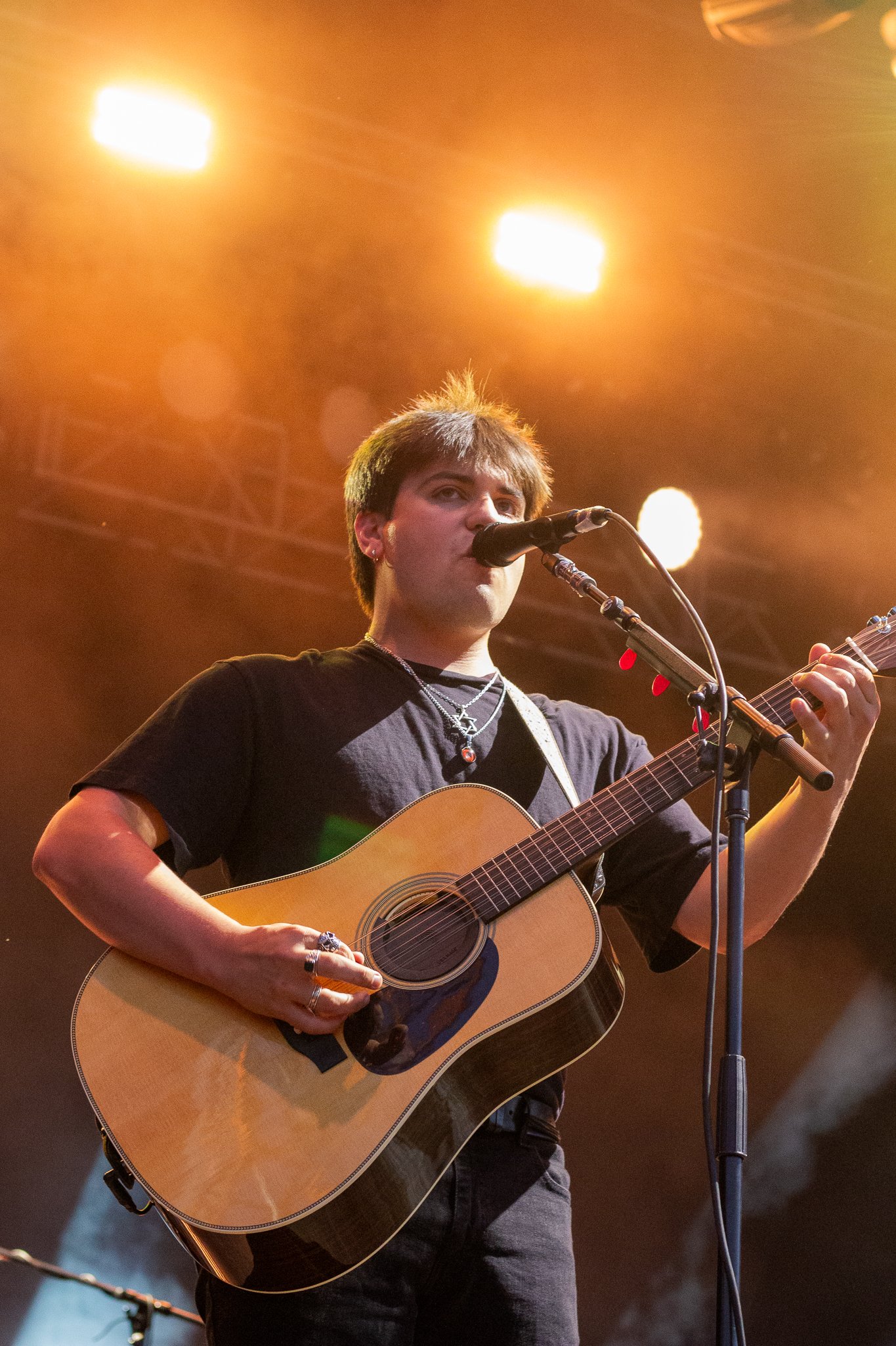  Noah Levine plays guitar for Noah Kahan’s evening set at the T-Mobile stage. 