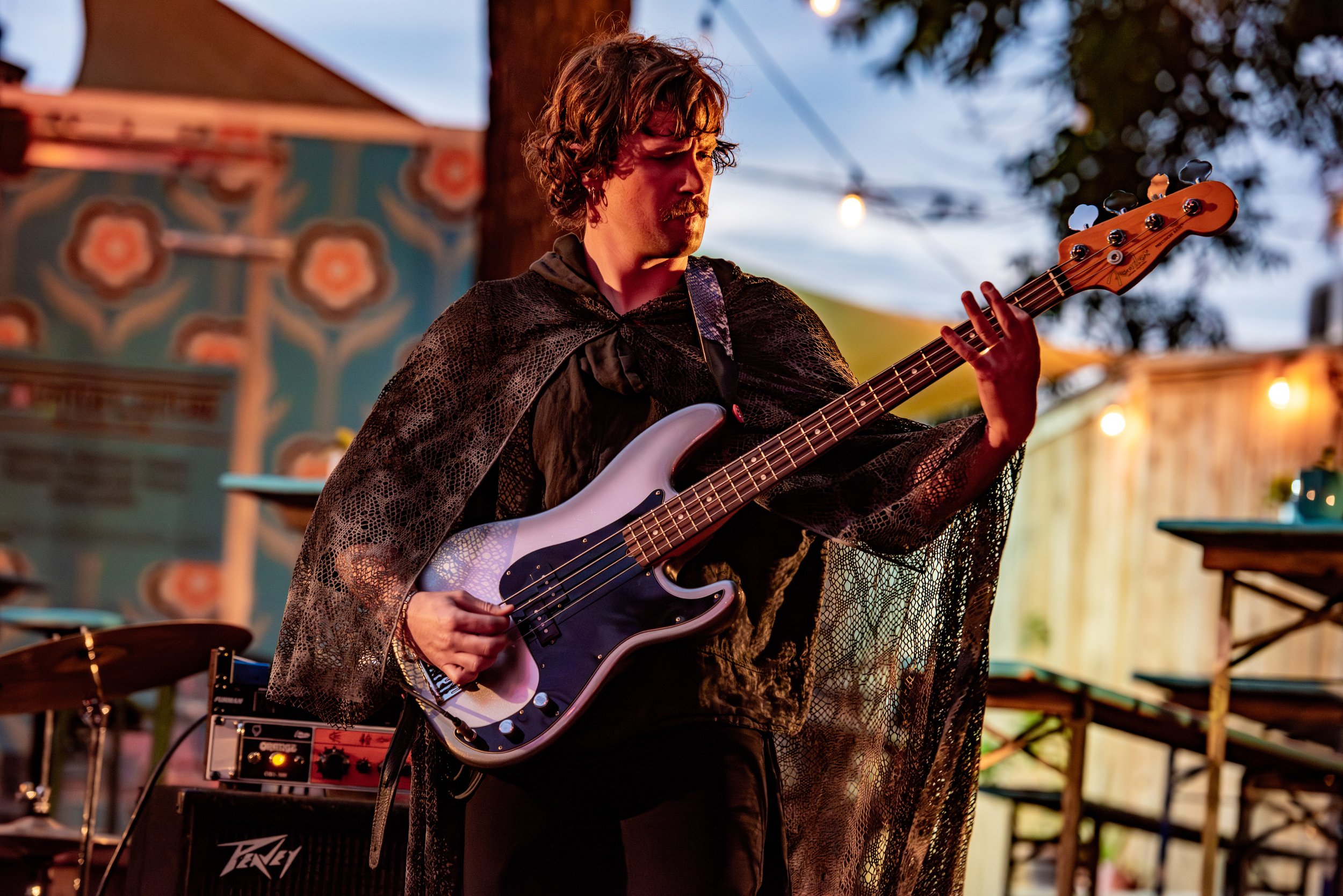  Dmitri’s bass player Lewis Grimes performs in his warlock costume.  Photo by Mackenzie Coleman  