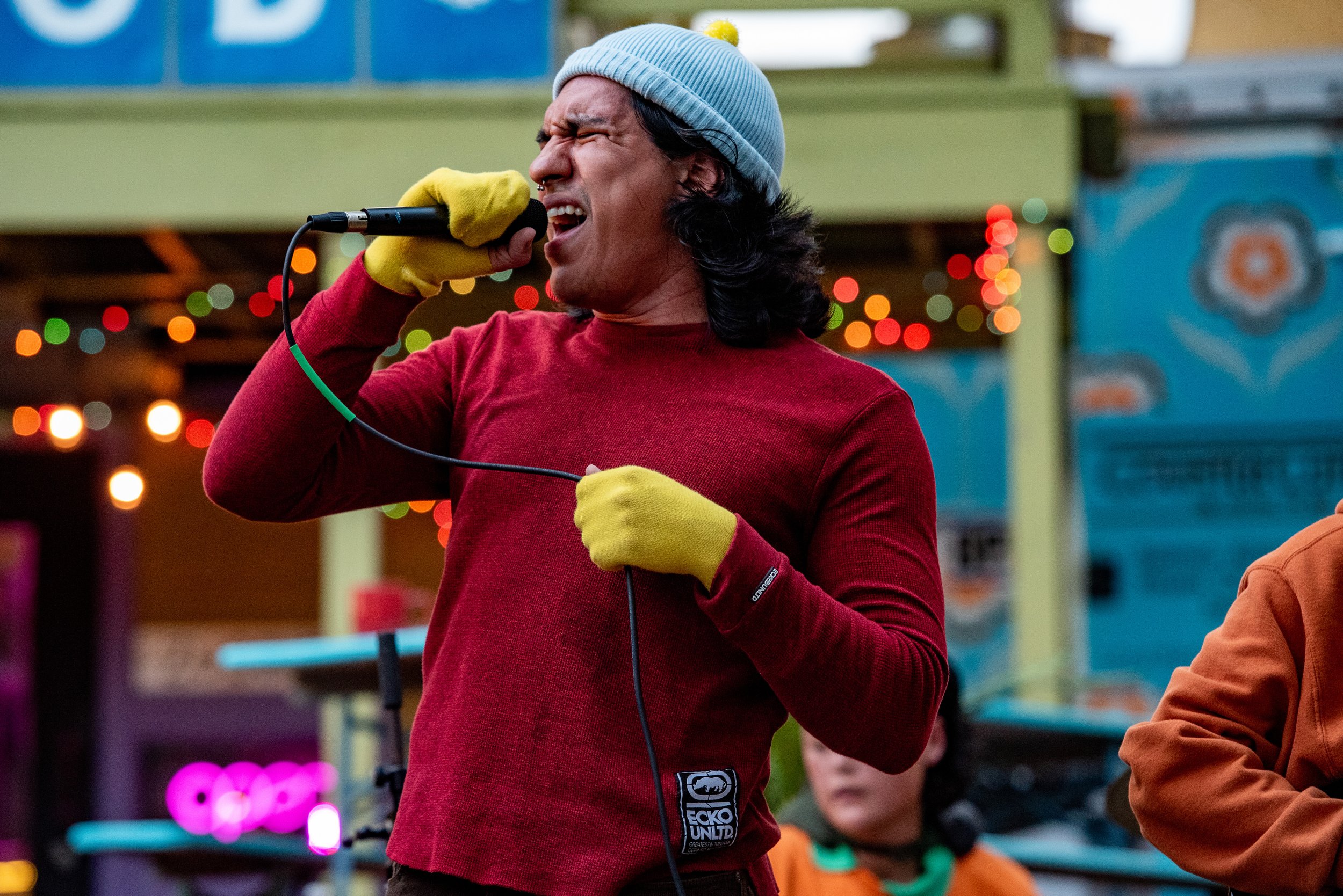  Guilermo Rodriguez of Tealwaves belts out a verse.  Photo by Mackenzie Coleman  
