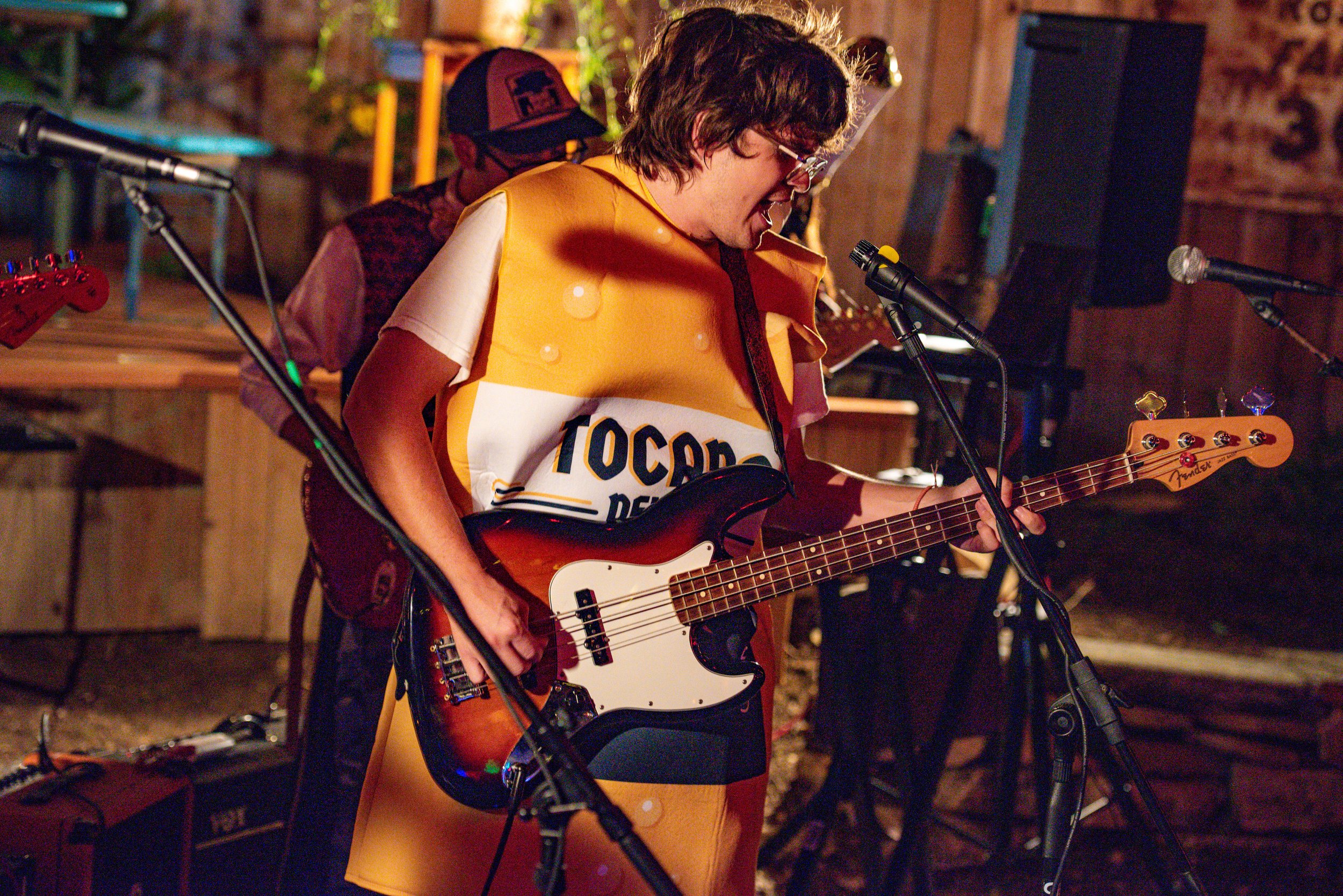  The lead singer of Stalefish screams the chorus into the microphone.  Photo by Mackenzie Coleman  