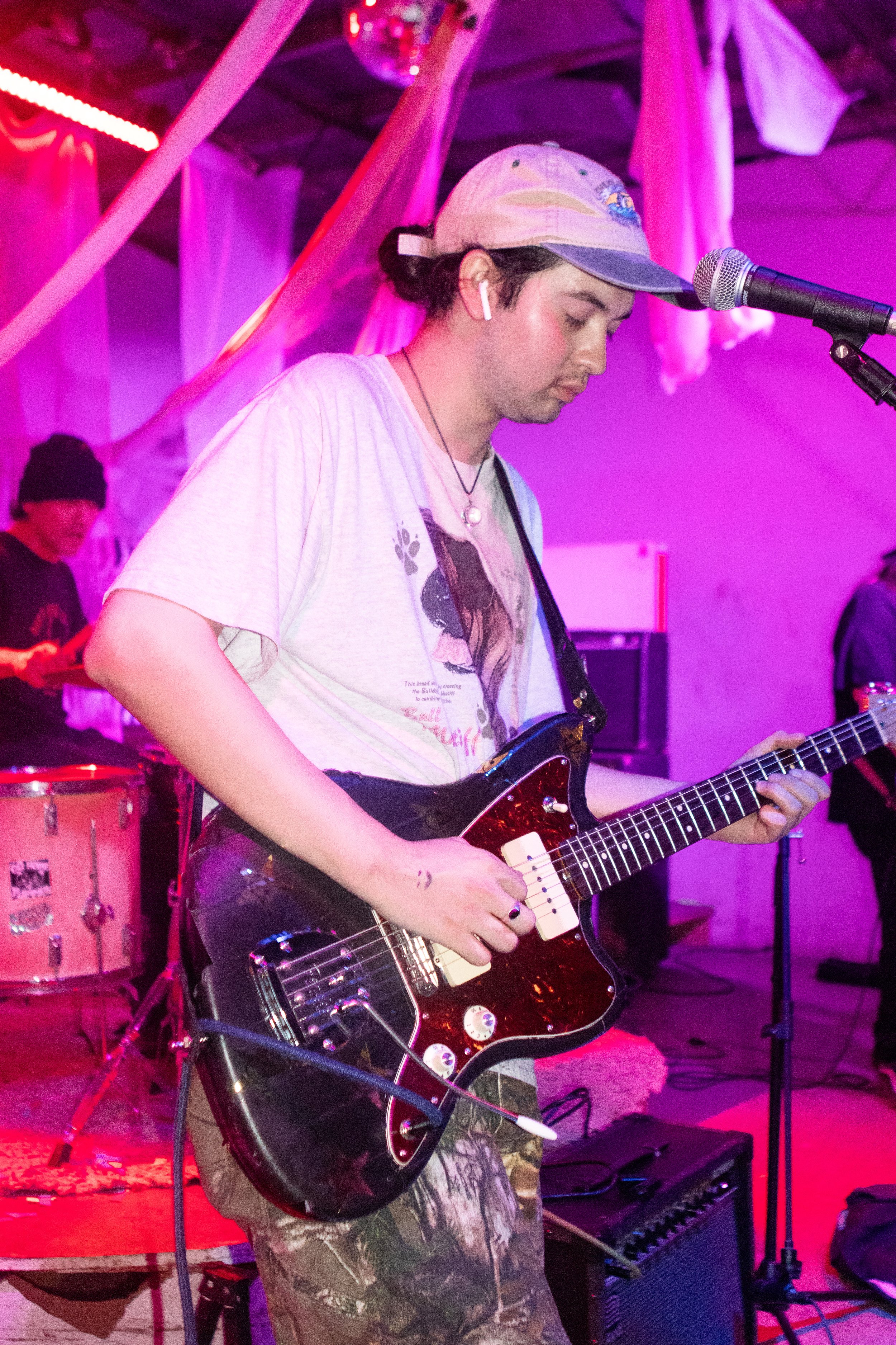  The rhythm guitarist of Hexenzense jams on his guitar.  Photo by Shefali Rao  