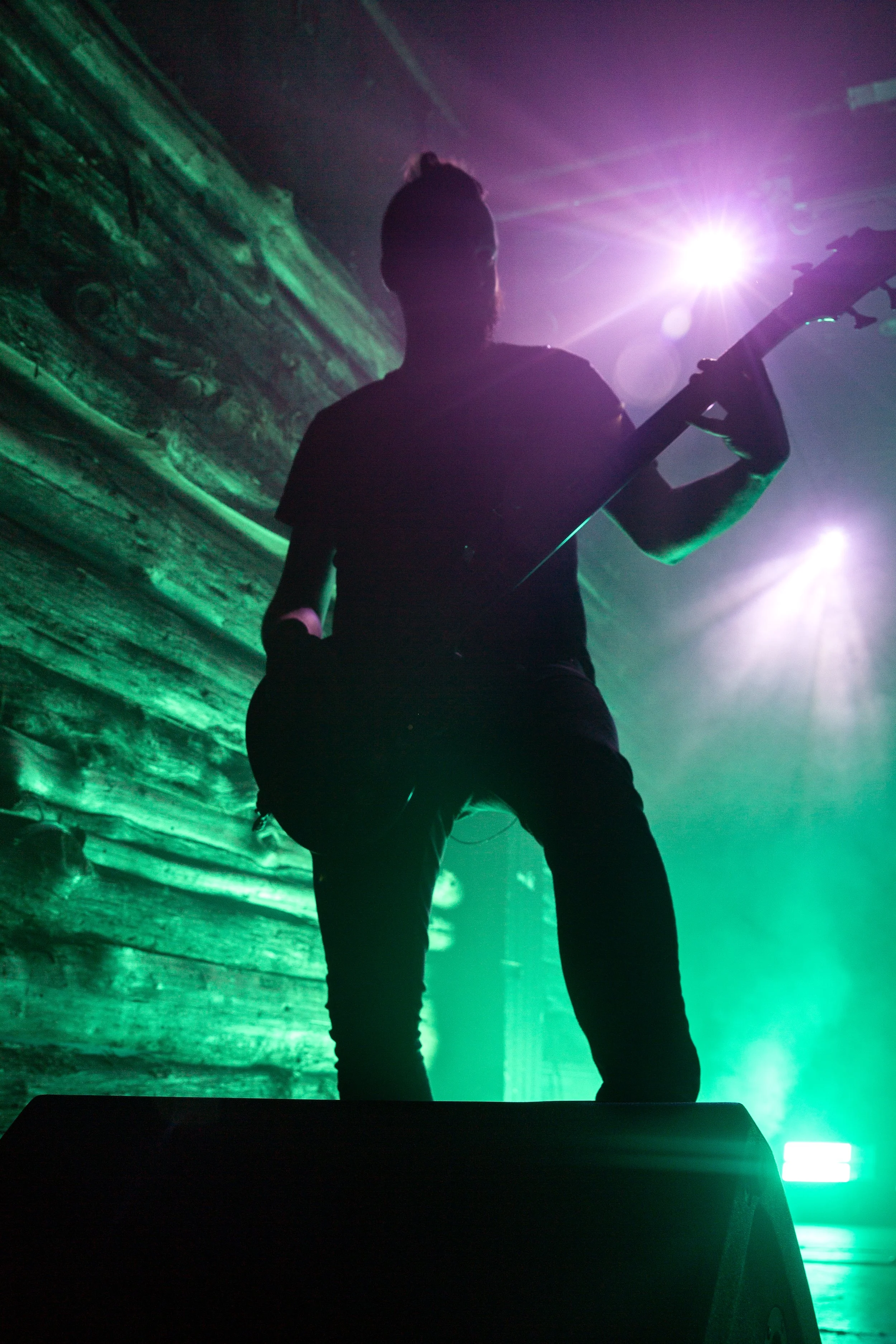  Niklas Sandin, the bassist of Katatonia, skillfully plays his bass. 