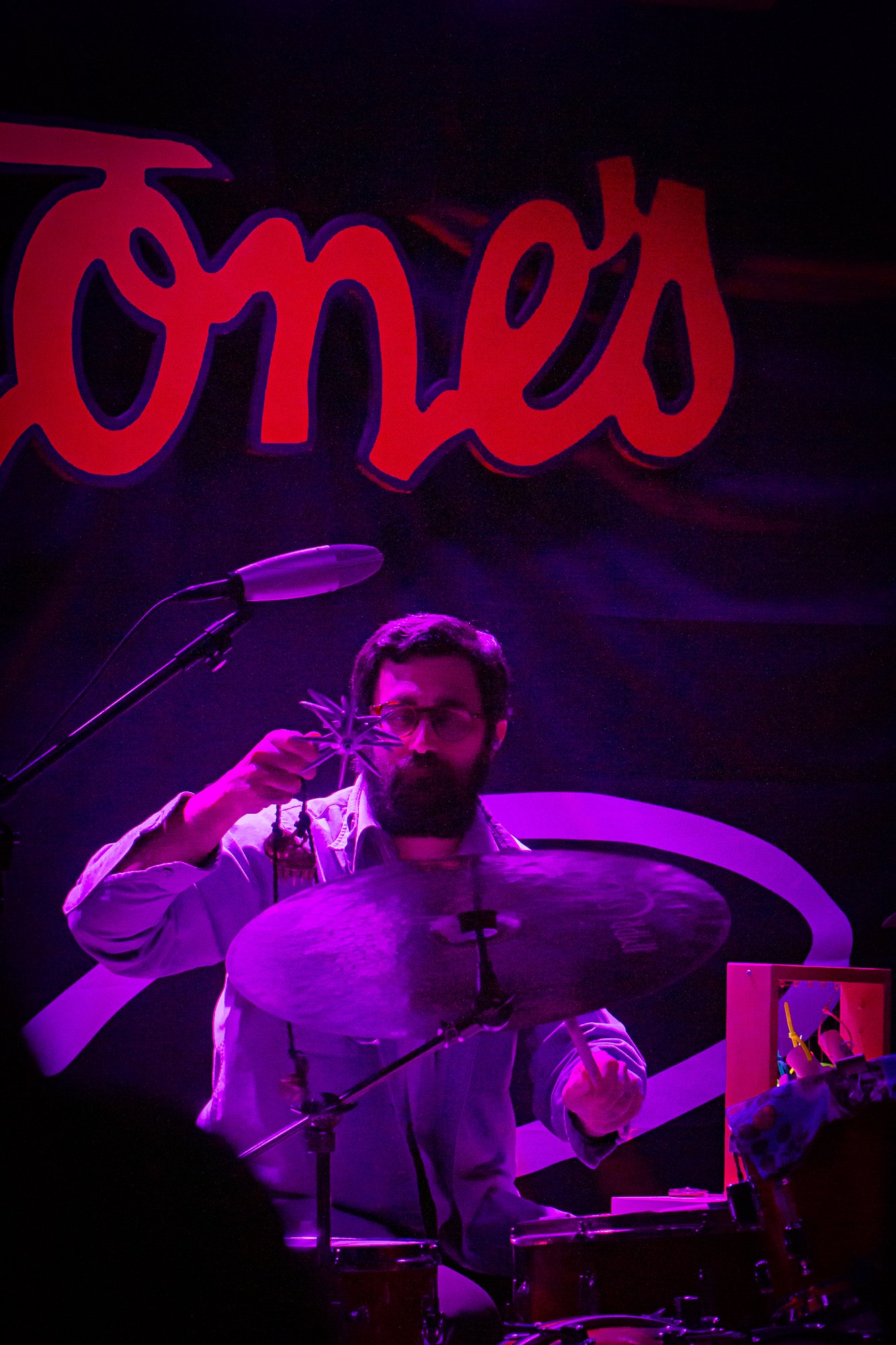  Andrew Maguire warms up on the drums before Chance Peña takes the stage. 