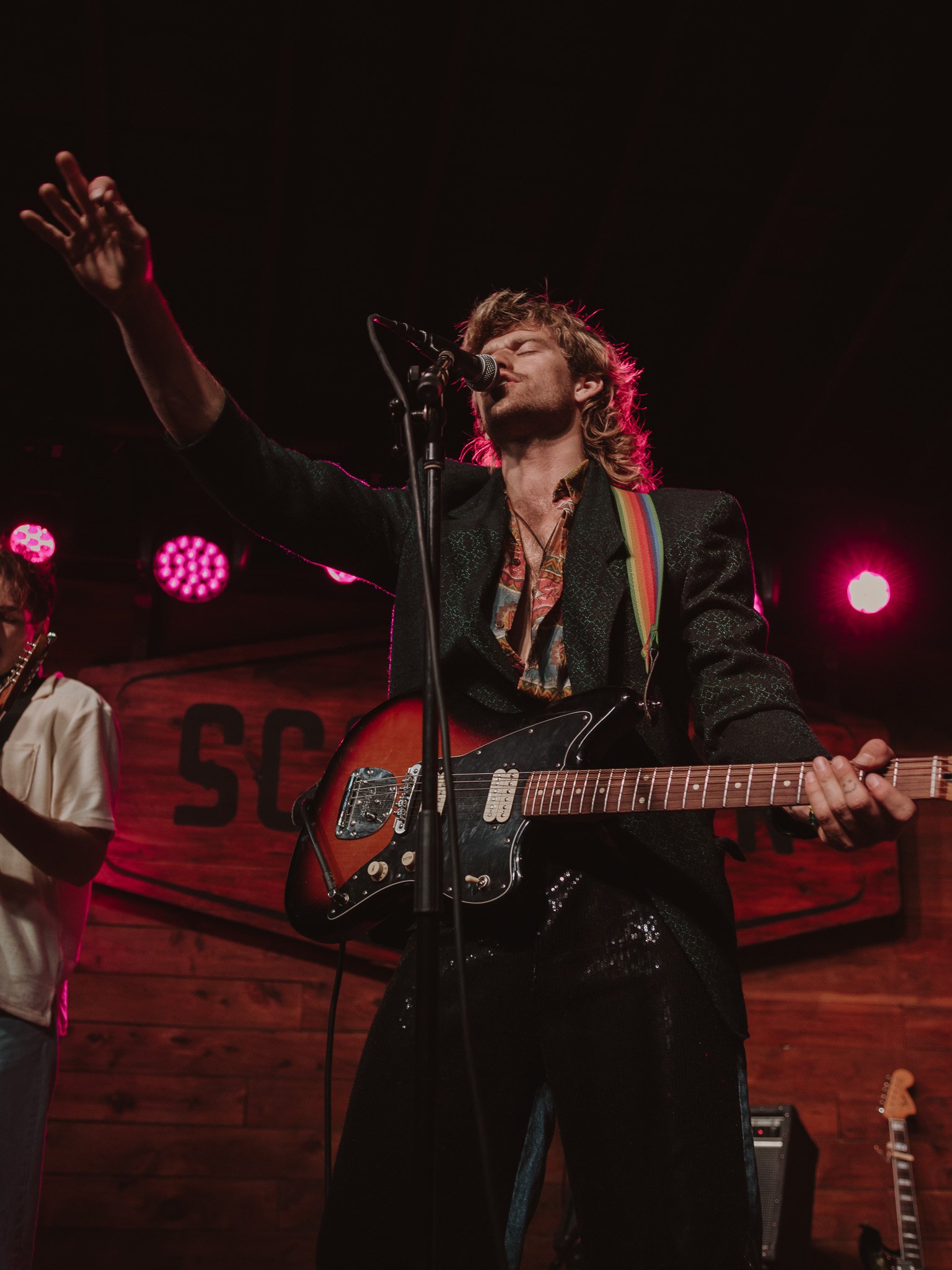  The Moss frontman Tyke James owns Scoot Inn’s historic stage in a sparkly black suit. 