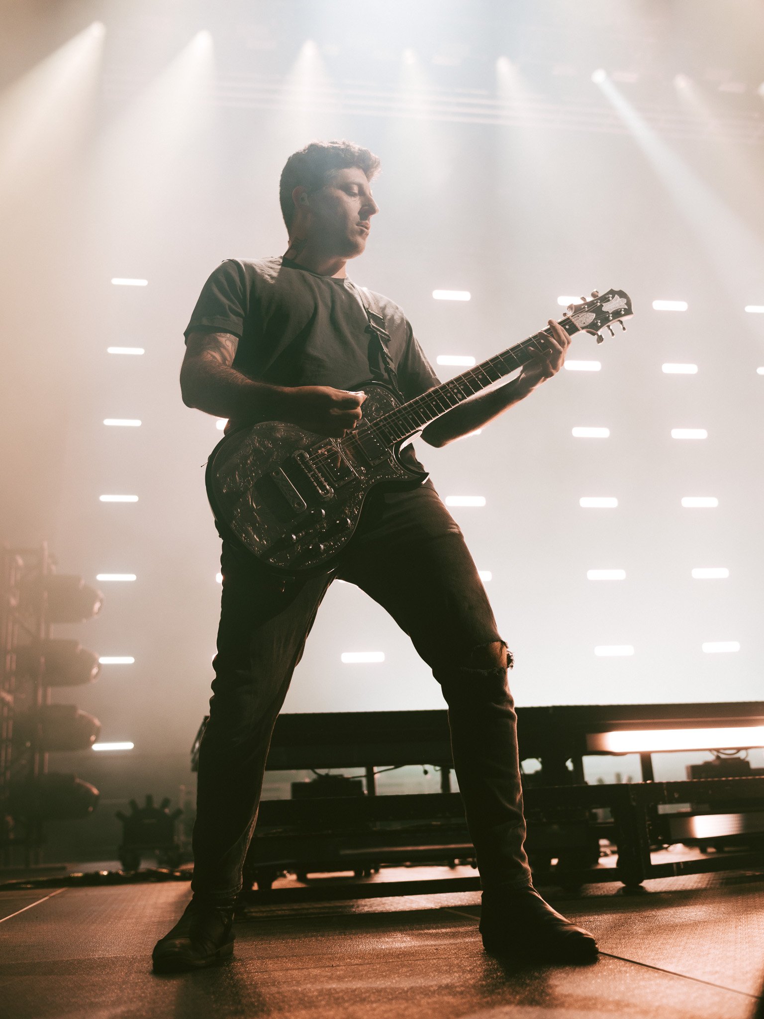  Fall Out Boy guitarist Joe Trohman plays passionately. 