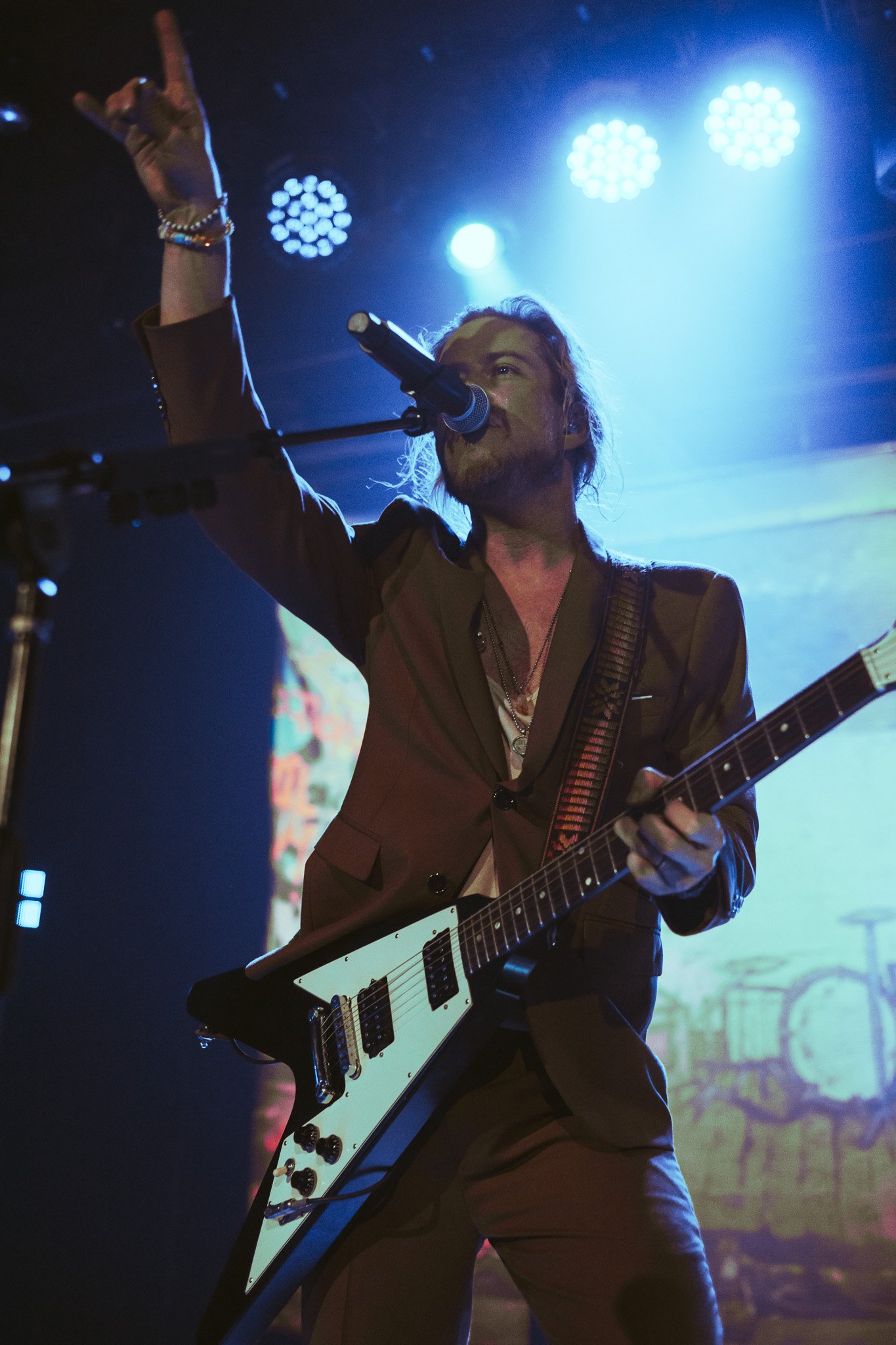  Avary points to the crowd as he sings. 