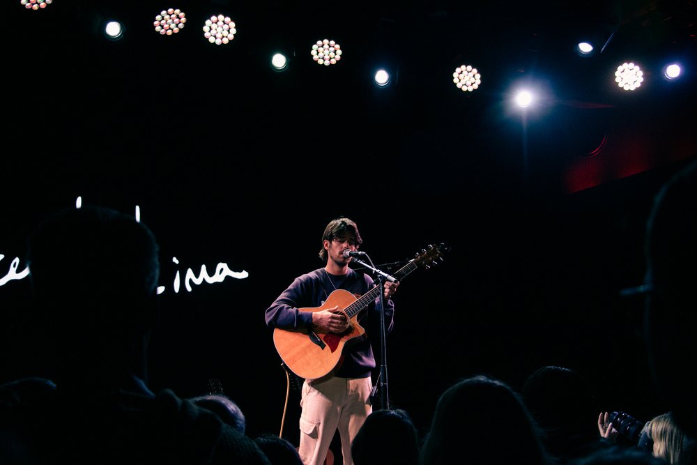  Indie-folk artist Vincent Lima performs a newly released song. 