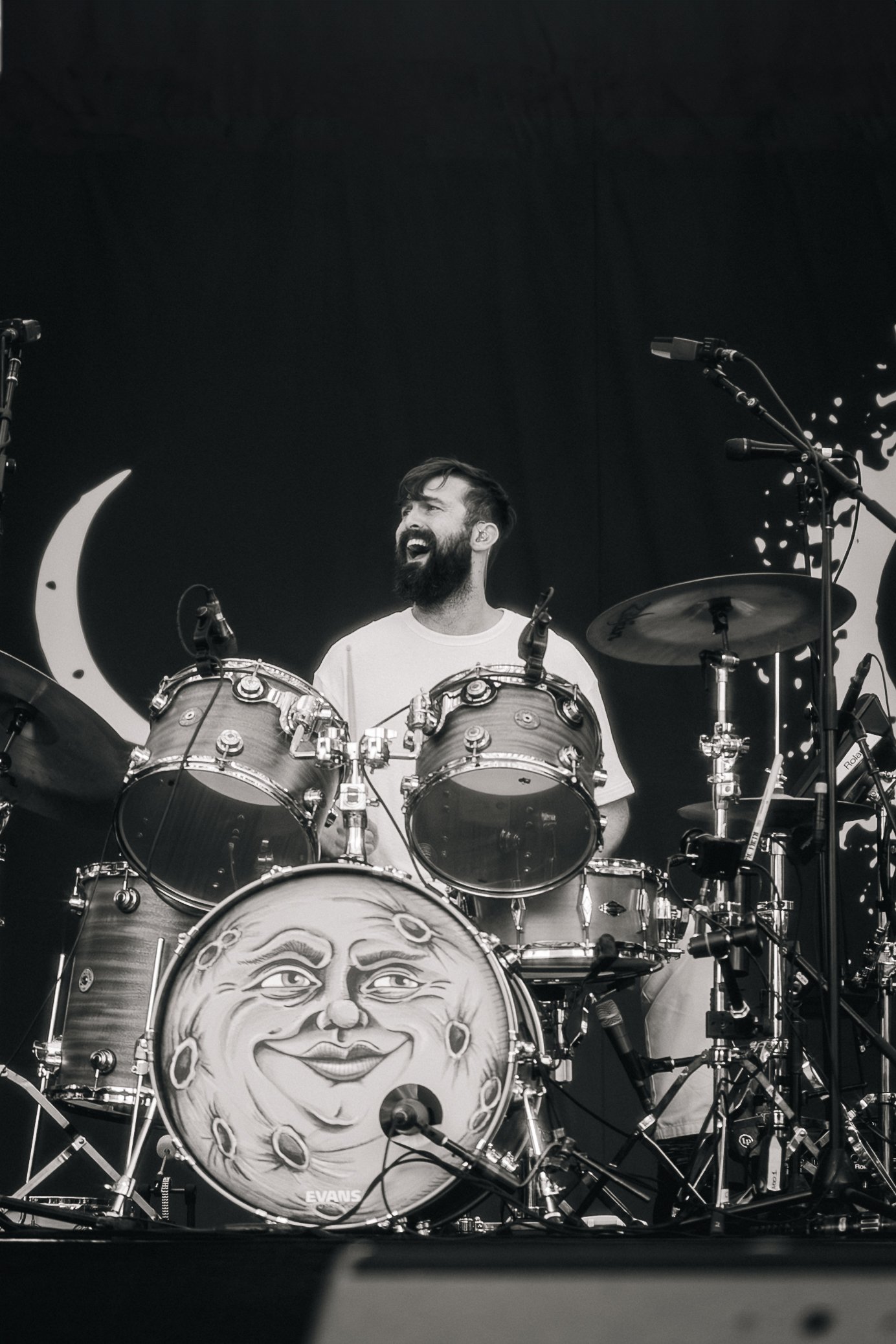  Chris Tomson shares a laugh with Vampire Weekend’s touring guitarist while drumming to “Classical.” 