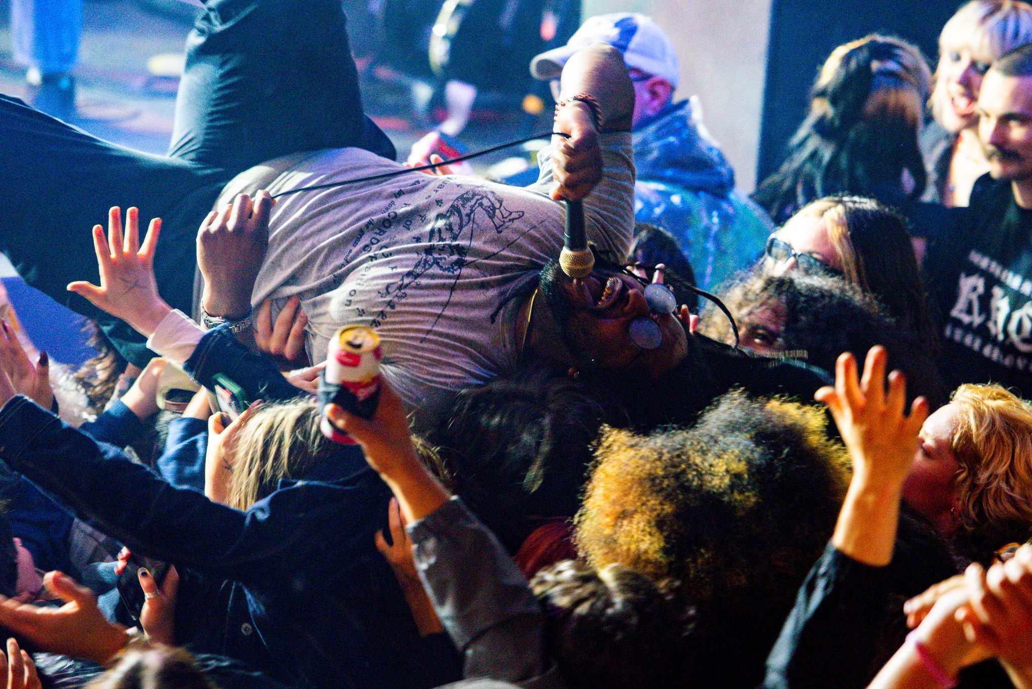  Pierce Jordan, the lead singer of Soul Glo, dives into the crowd.&nbsp; 
