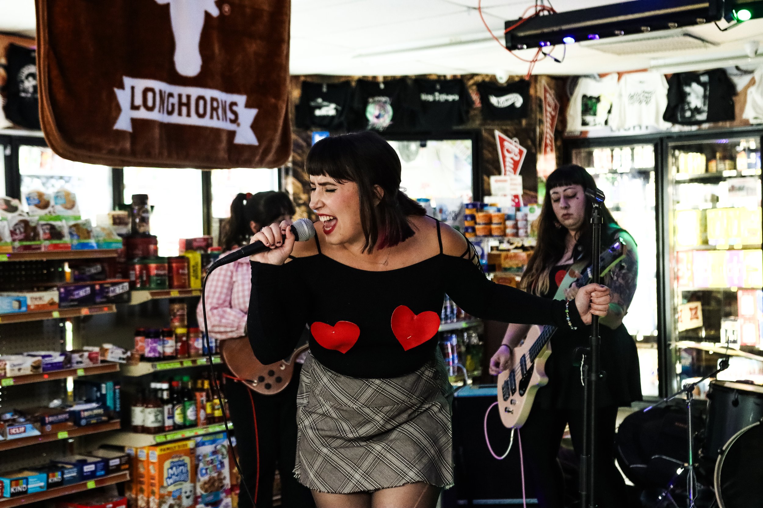 Boo85's lead singer, Carissa Eckle X, belts the chorus of "Not Your Girl," the band's latest single, released on Nov. 22. Photo by Ava Snoozy.