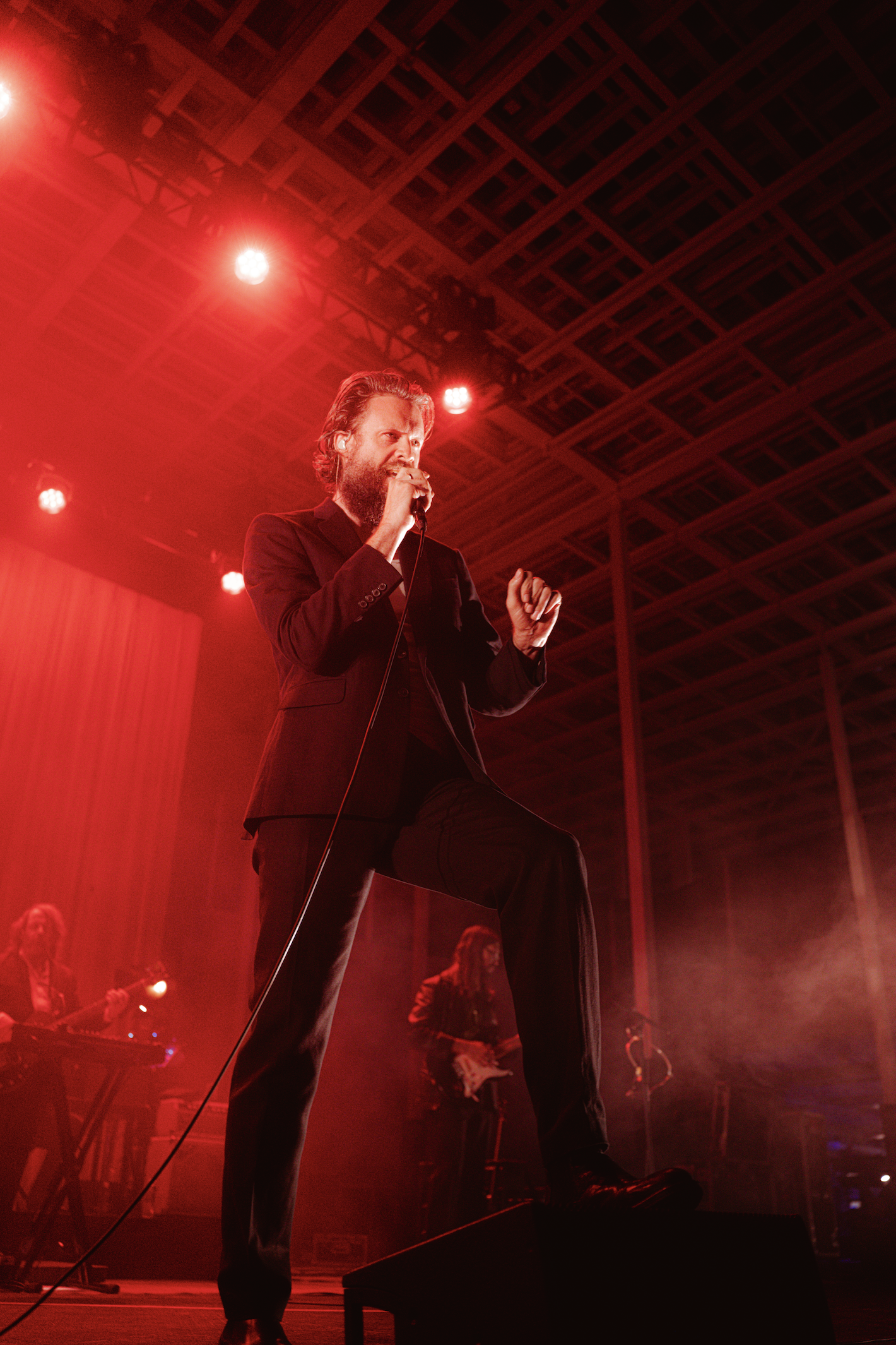 Abandoning the guitar, Father John Misty dances as he sings the lyrics to his opening song: “Most of us old men die at the firing line / Just waiting for our number to be called / I guess time just makes fools of us all.”