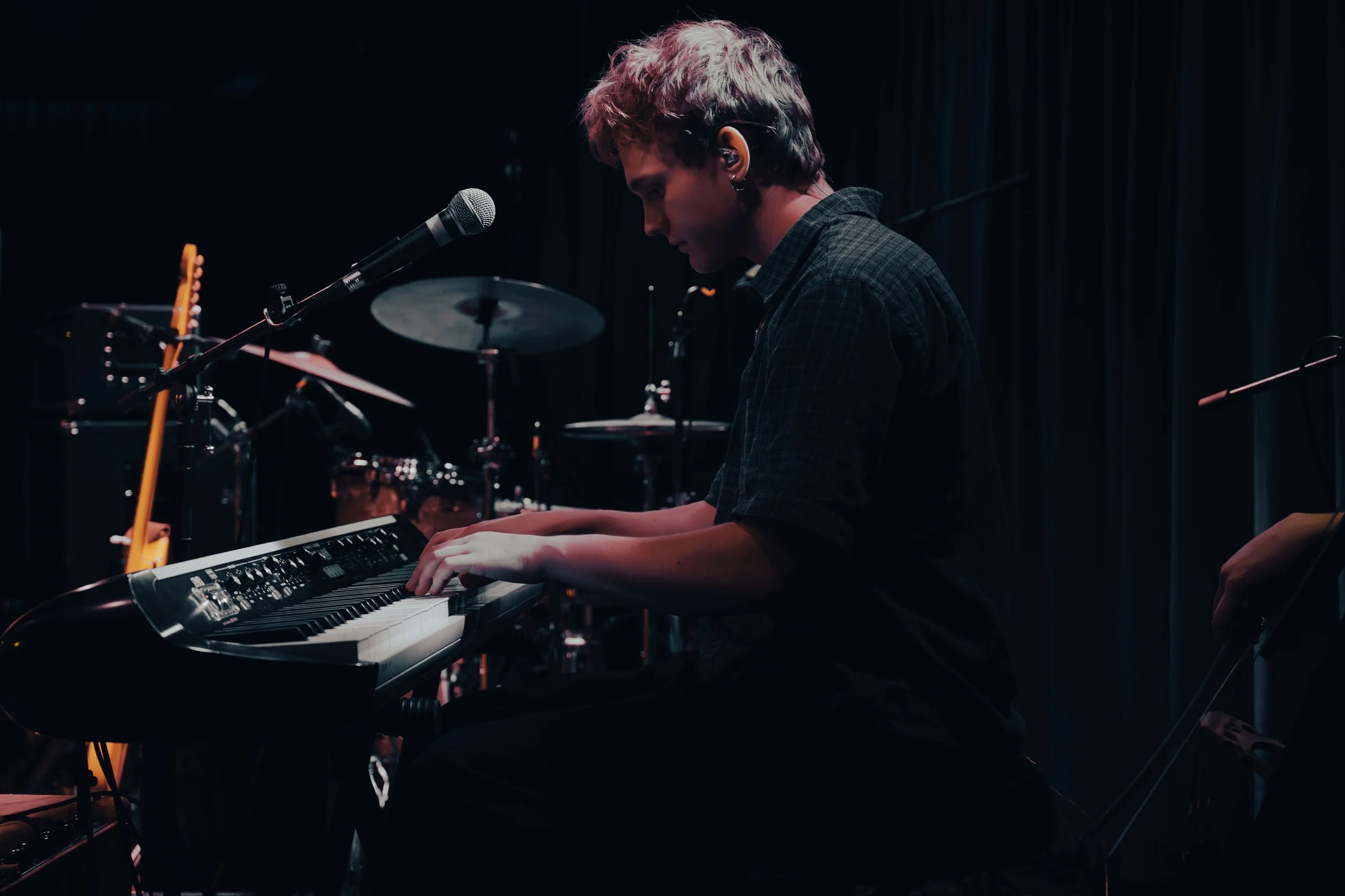 Drummer Douglas Frost starts English Teacher’s set playing melodic piano for a slow build tune, “This Could Be Texas.”