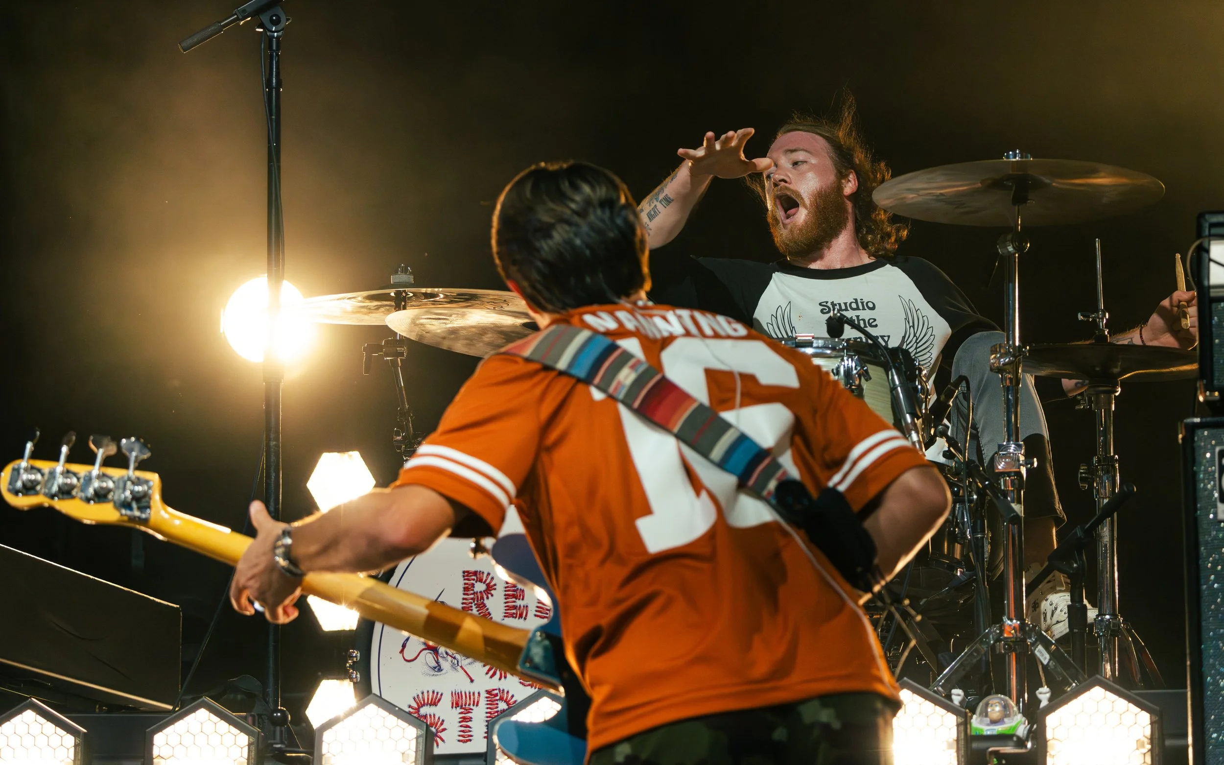 Drummer John Hall and bass player Andrew Bishop passionately drive the music during the chorus of “Stone’s Throw.”