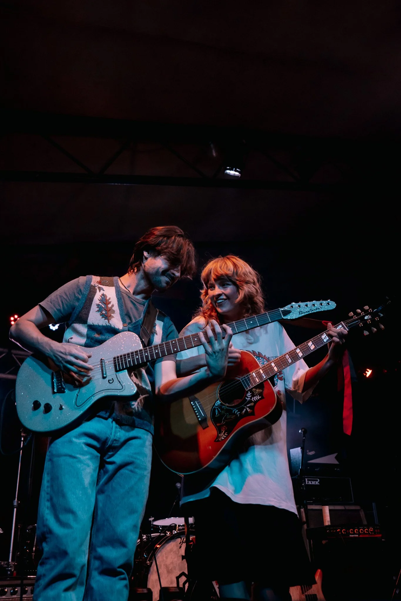 Bass guitarist Andrew Maney and Linka Moja share a moment between performances of “Blood Orange” and “House of the Rising Sun.”