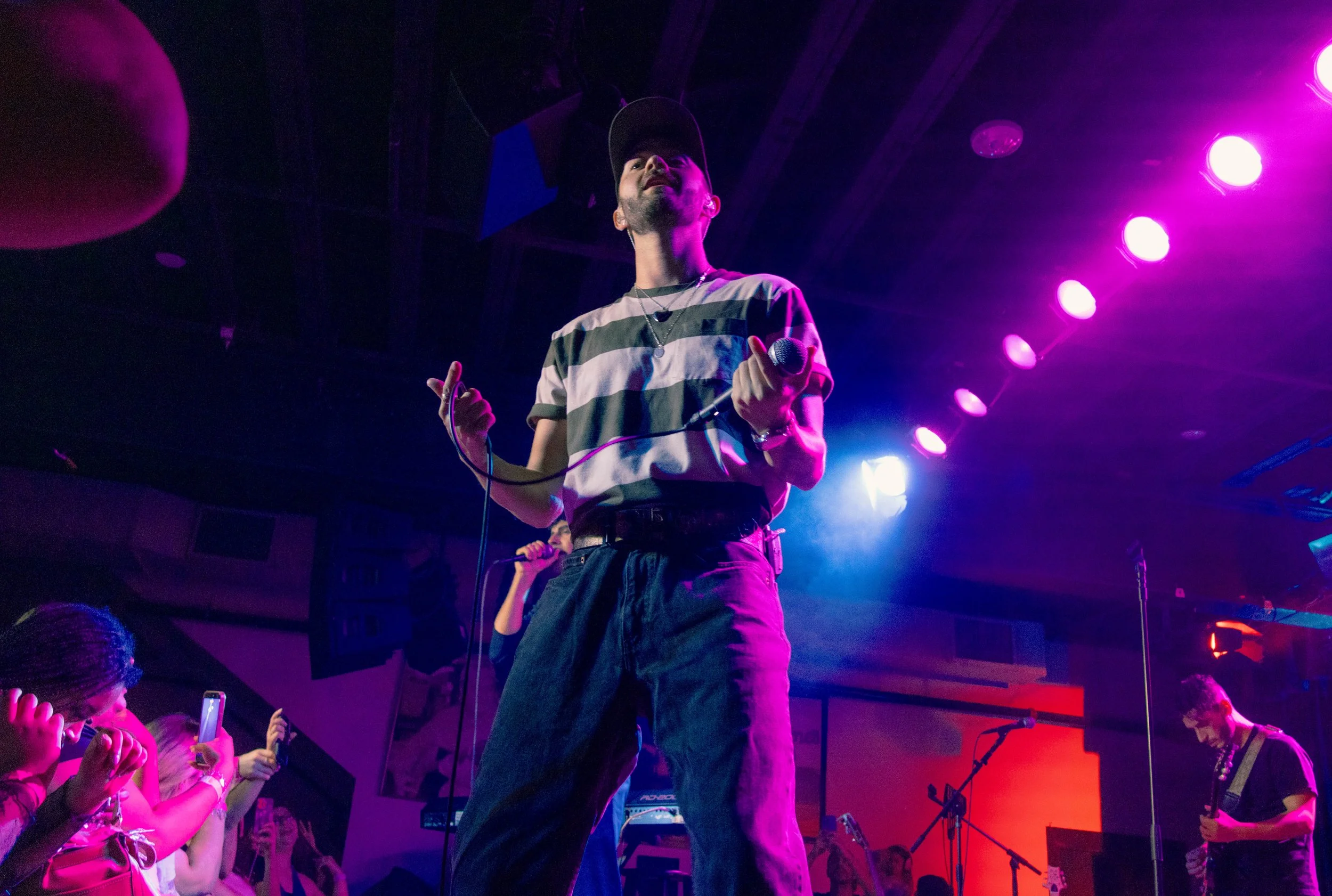  Johnson and Gilinsky sing to an energetic crowd during their song “Role Model.” 
