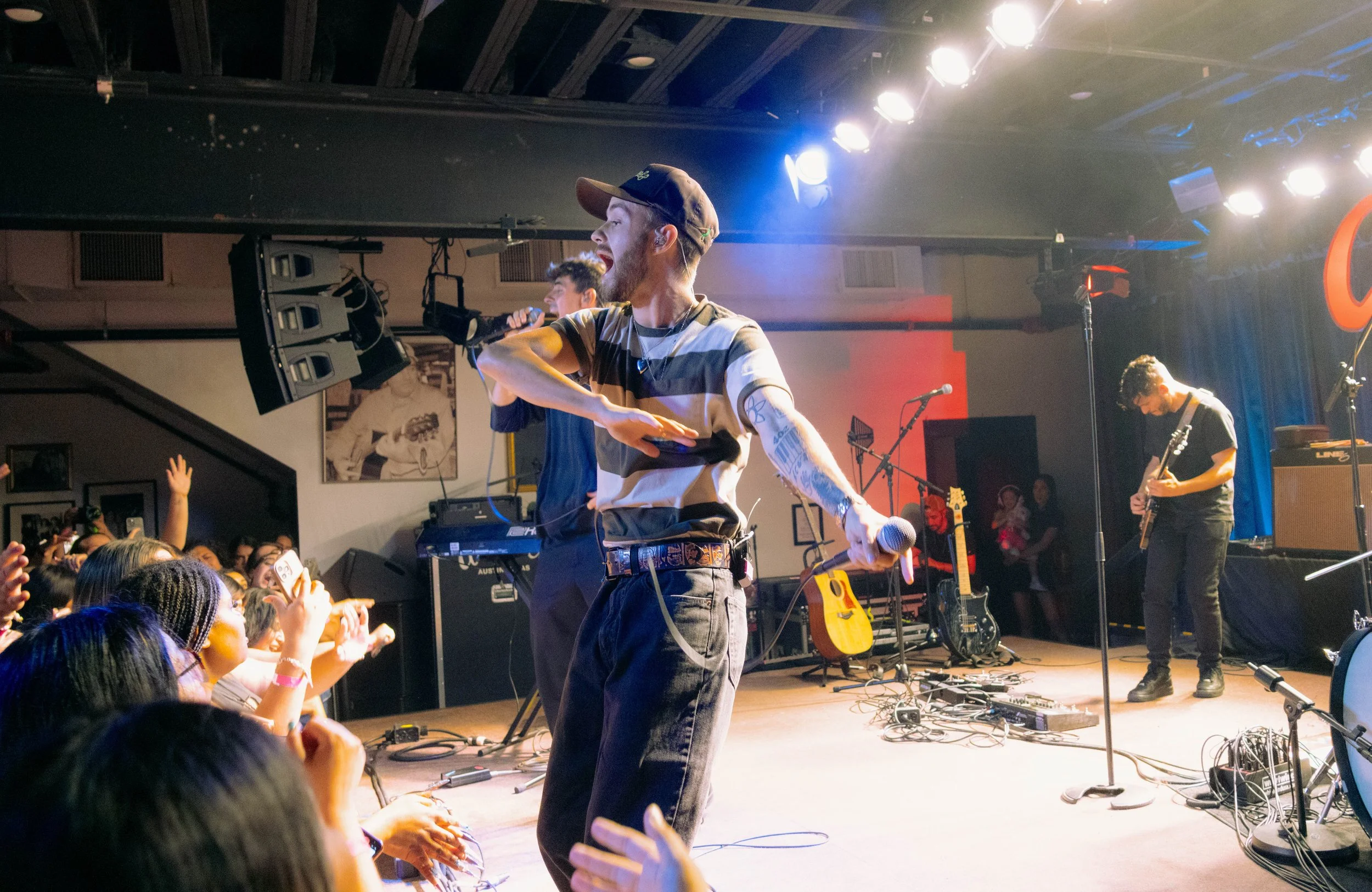  Johnson and Gilinsky sing to an energetic crowd during their song “Role Model.” 