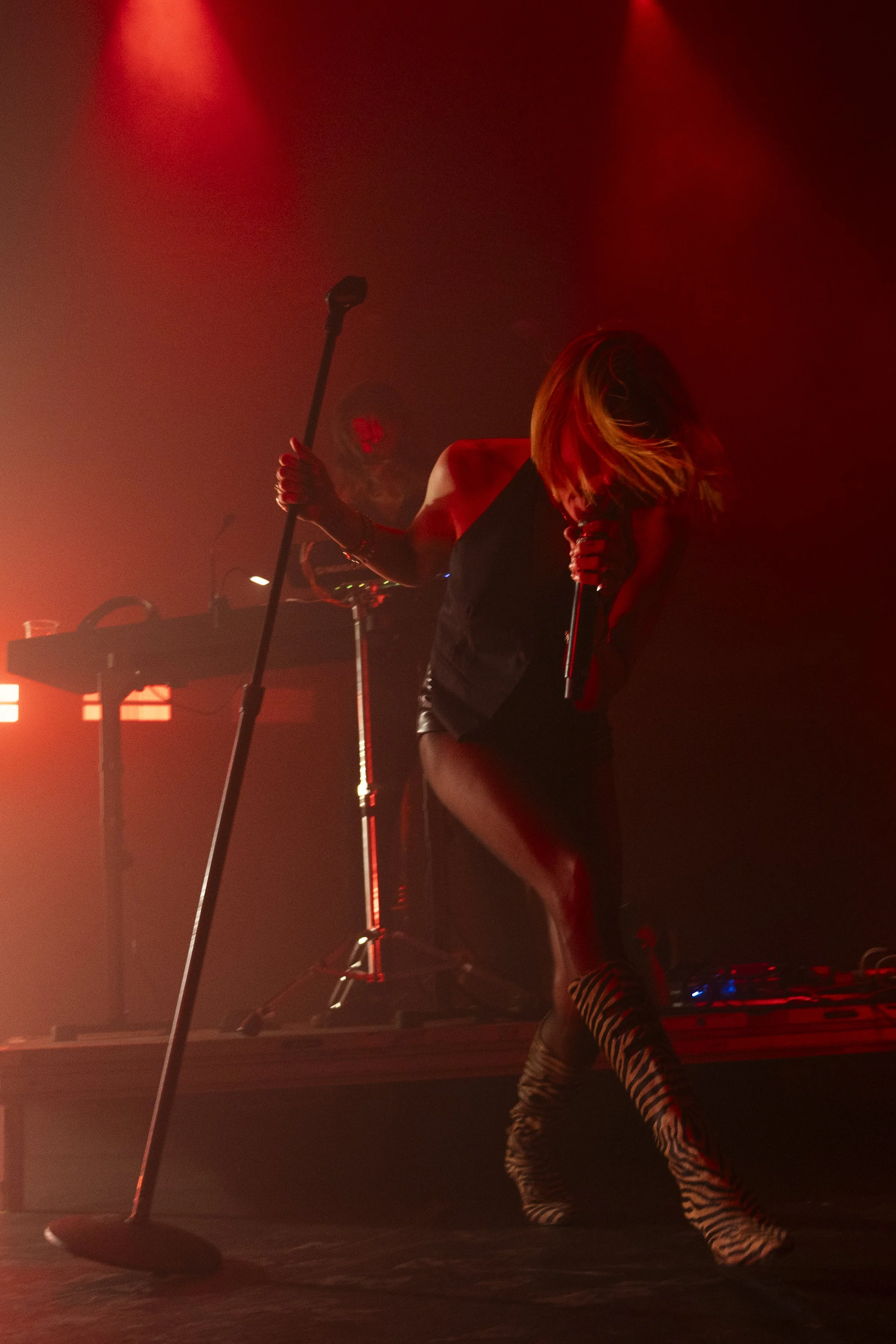  Barthel wields the microphone with a hypnotic, hyperactive stage presence roaring&nbsp; Phantogram’s genre-bending electro-pop. 