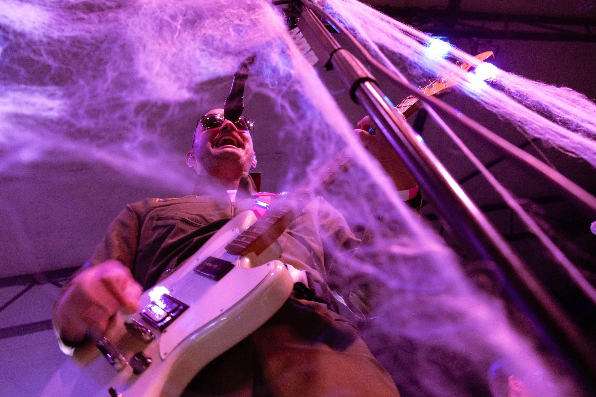  McCracken sings around cobweb decorations during Y’all Out Boy’s cover of “Swing Swing” by The All-American Rejects. 