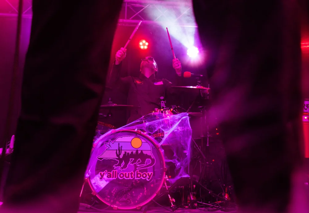  Drummer Wylie Sanchez raises his sticks in the air during “I’m Not Okay (I Promise)” by My Chemical Romance. 