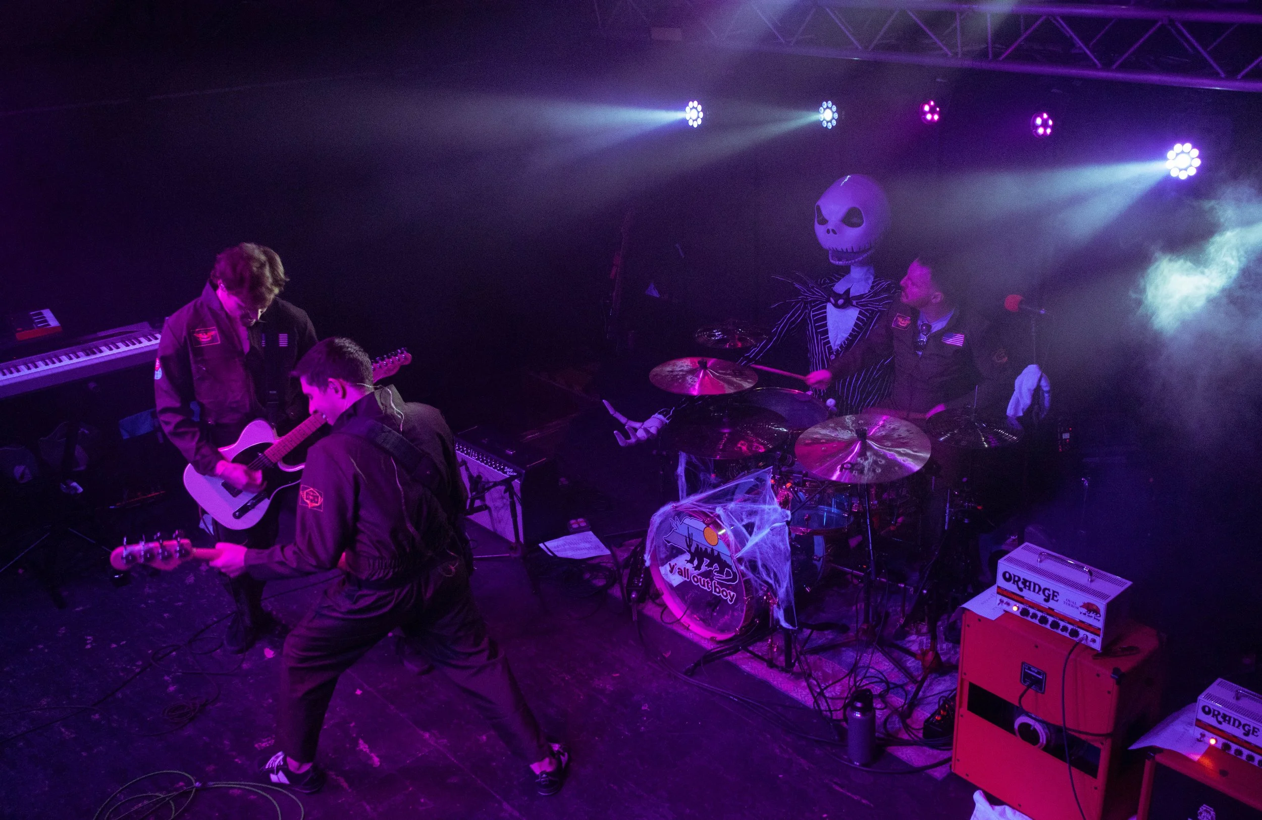  Cairns, Kemmerer, and Sanchez rock out with each other during “Fat Lip” by Sum 41. 