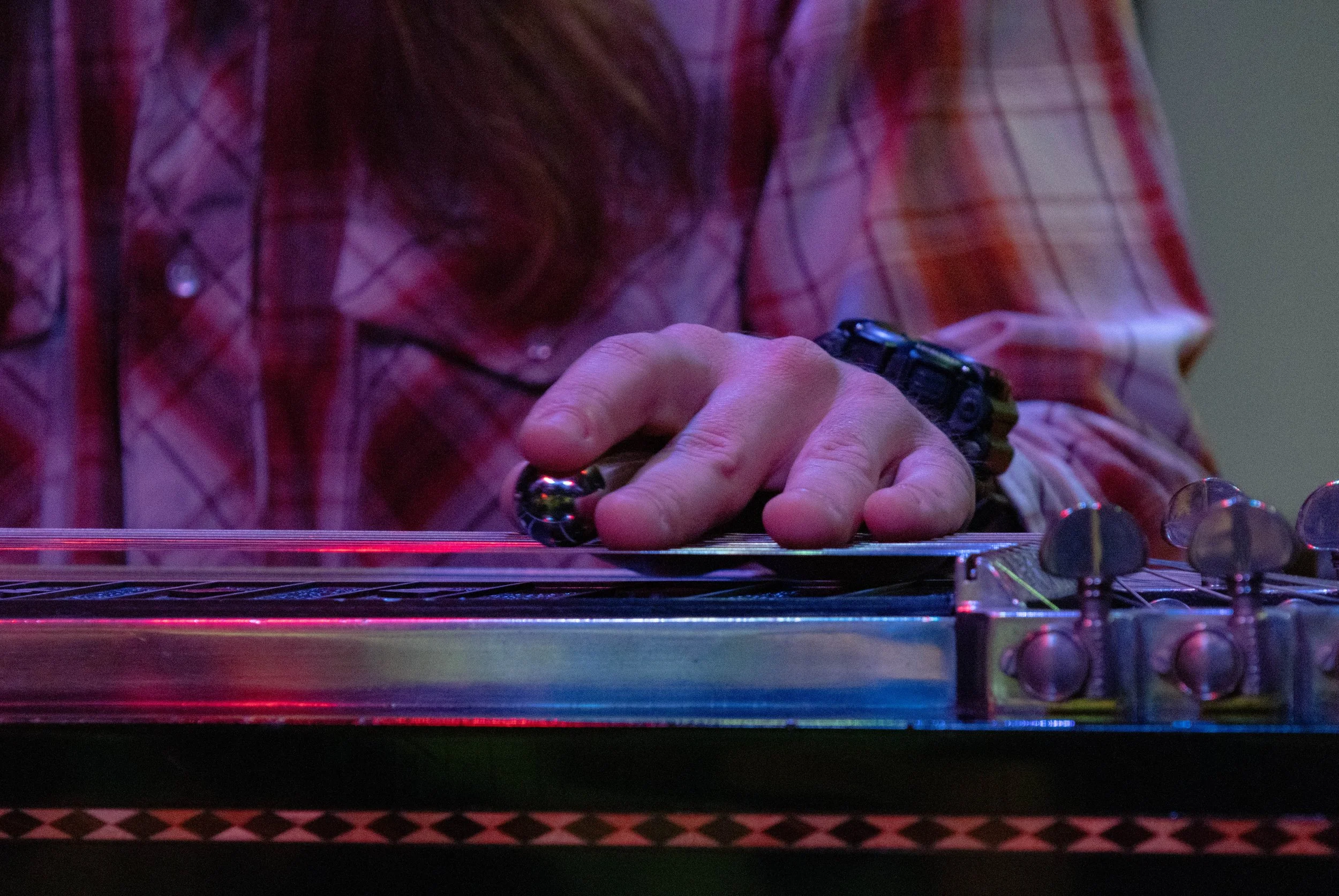  Tyler Friedman slides his finger against the steel guitar, adding a smooth element to “Road Dog Prayer.” 