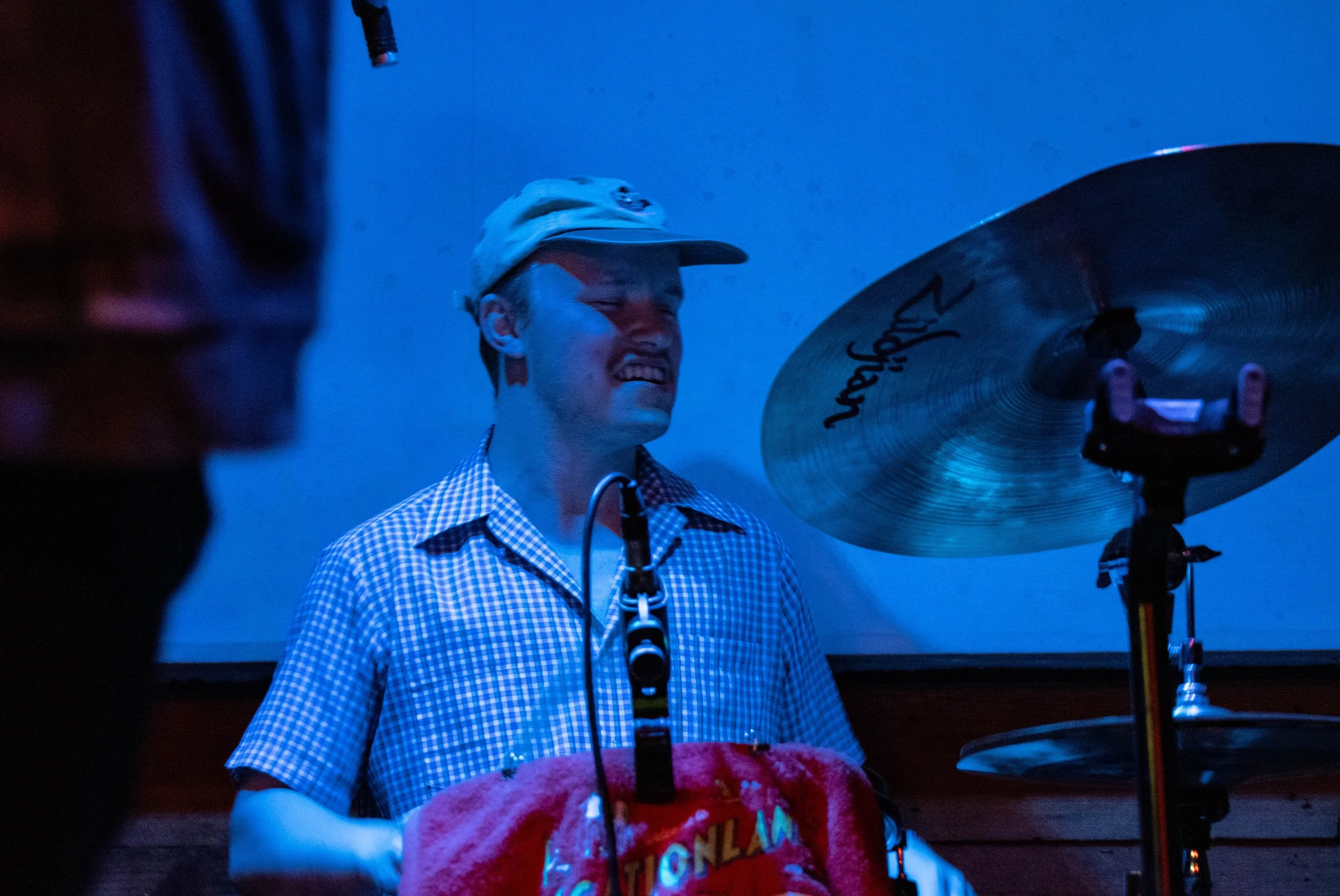  Drummer Nathaniel Phil gets into the groove of the steady tempo in “Tall Tales and Old News.” 