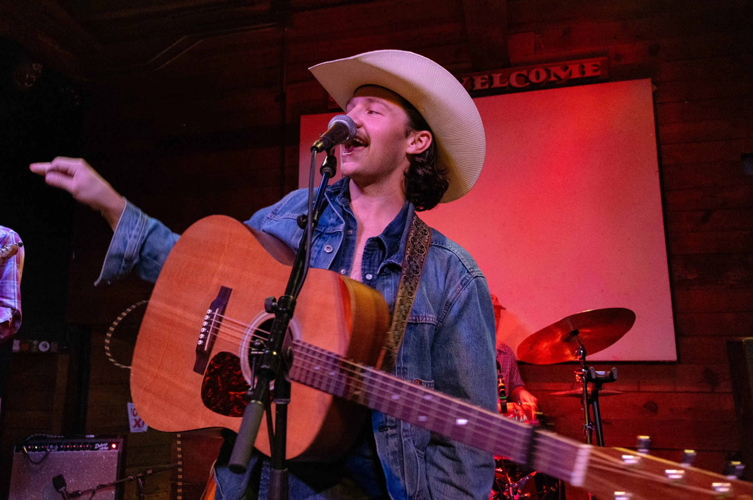  Jack Blocker reacts to the crowd during “Tall Tales and Old News.” 