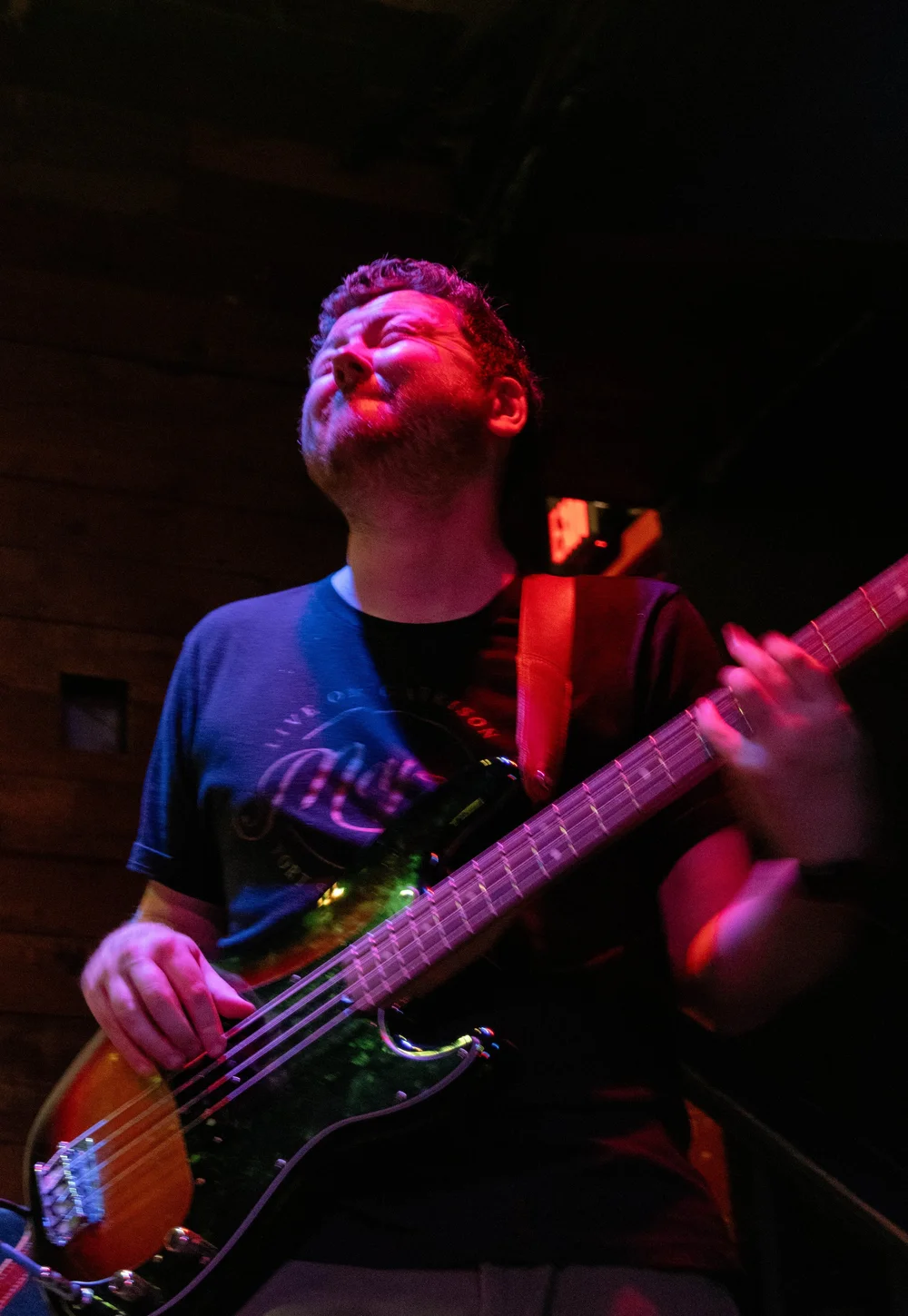  Bassist James Yardley plays heavy bass during the cover of “Big River” by Johnny Cash. 