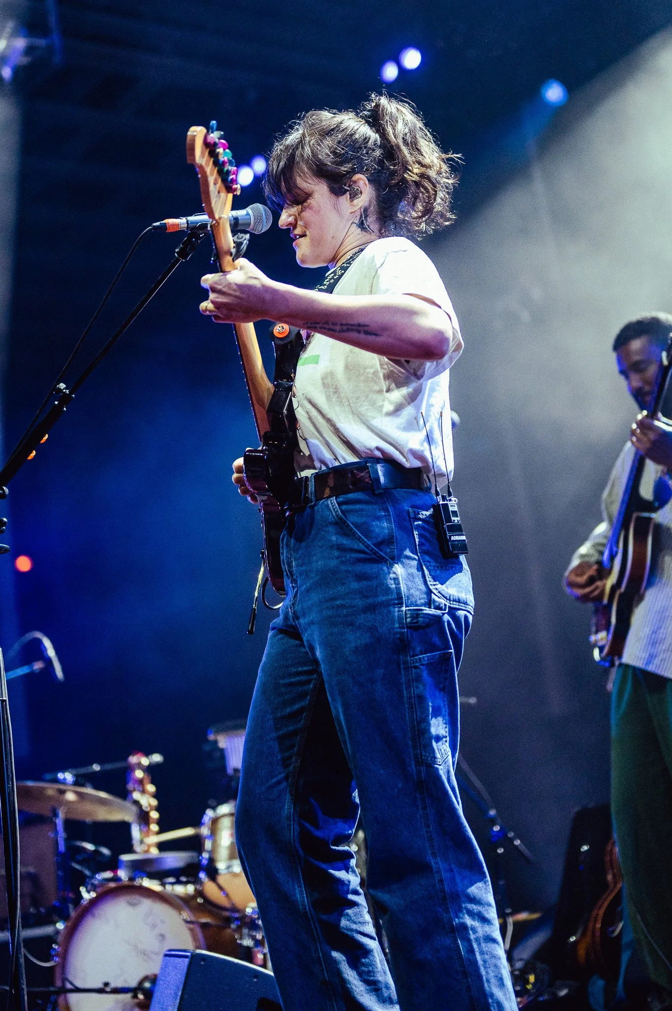  Bright and resonant guitar riffs cut across stage as lead singer and songwriter Adrianne Lenker jams with guitarist Buck Meek. 