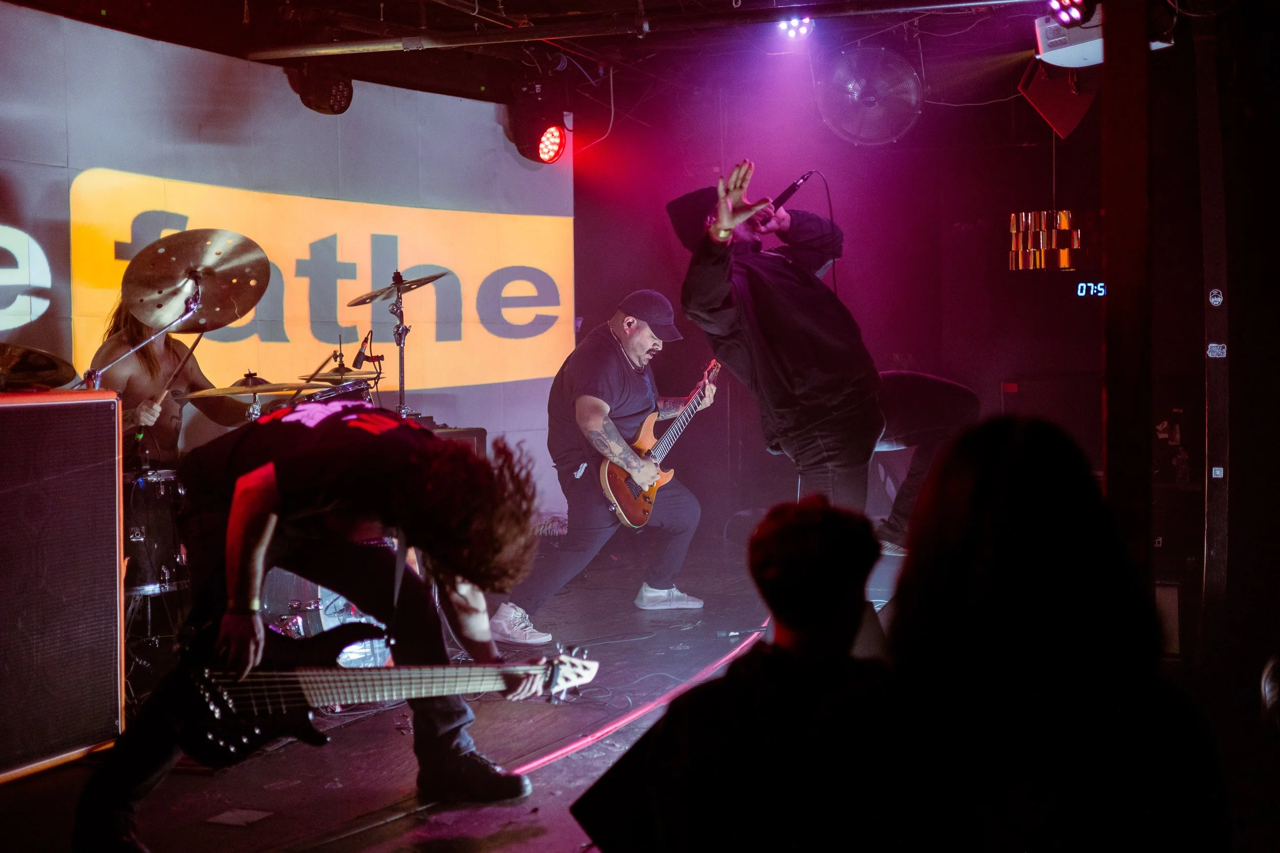   3-4: Bassist TJ Prodigalidad and lead singer John Slofkoski show off their skills as they perform Snakefather’s title track “No More Faces” off its 2024 album. 