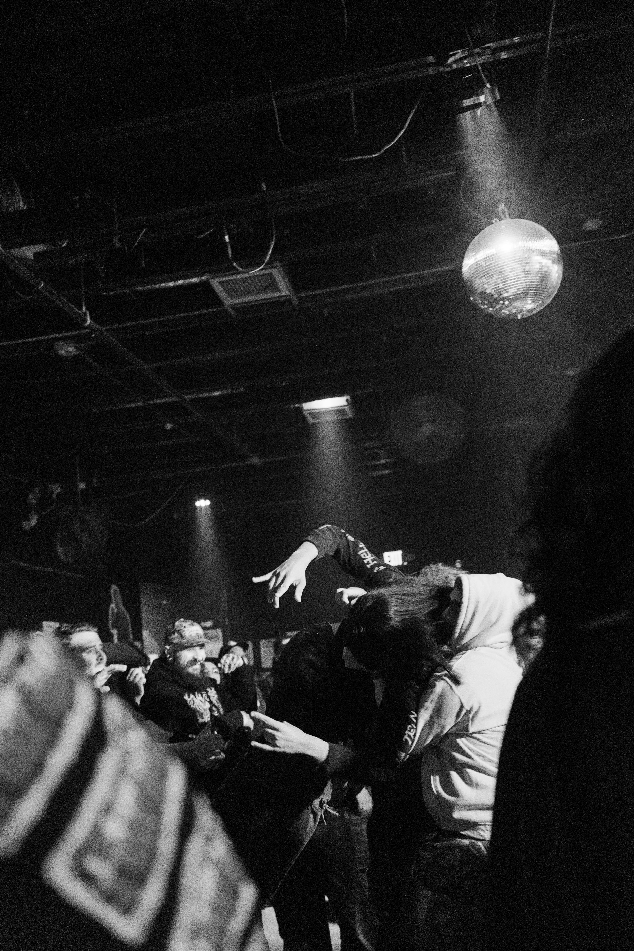  Metal fans tear up the mosh pit as they dance to Boltcutter’s song “Twenty One Cars.” 