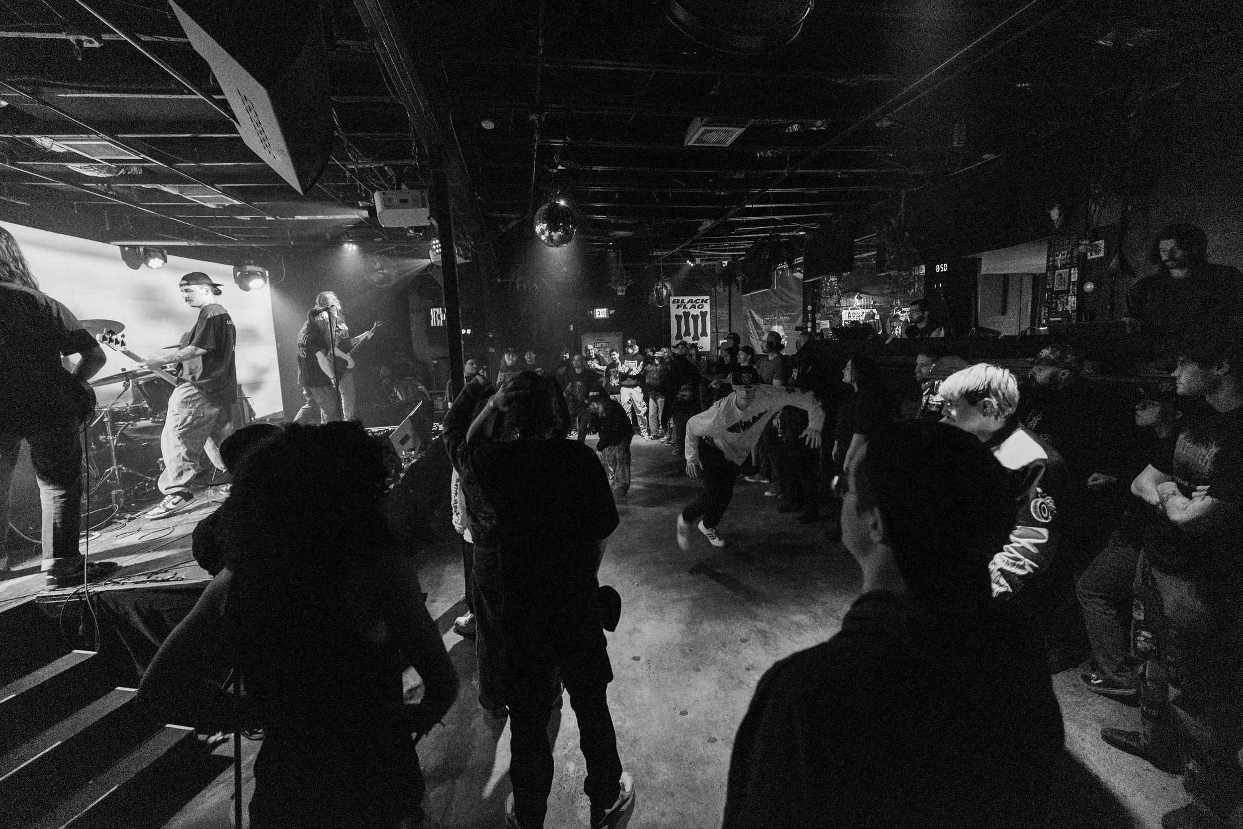  Metal fans tear up the mosh pit as they dance to Boltcutter’s song “Twenty One Cars.” 