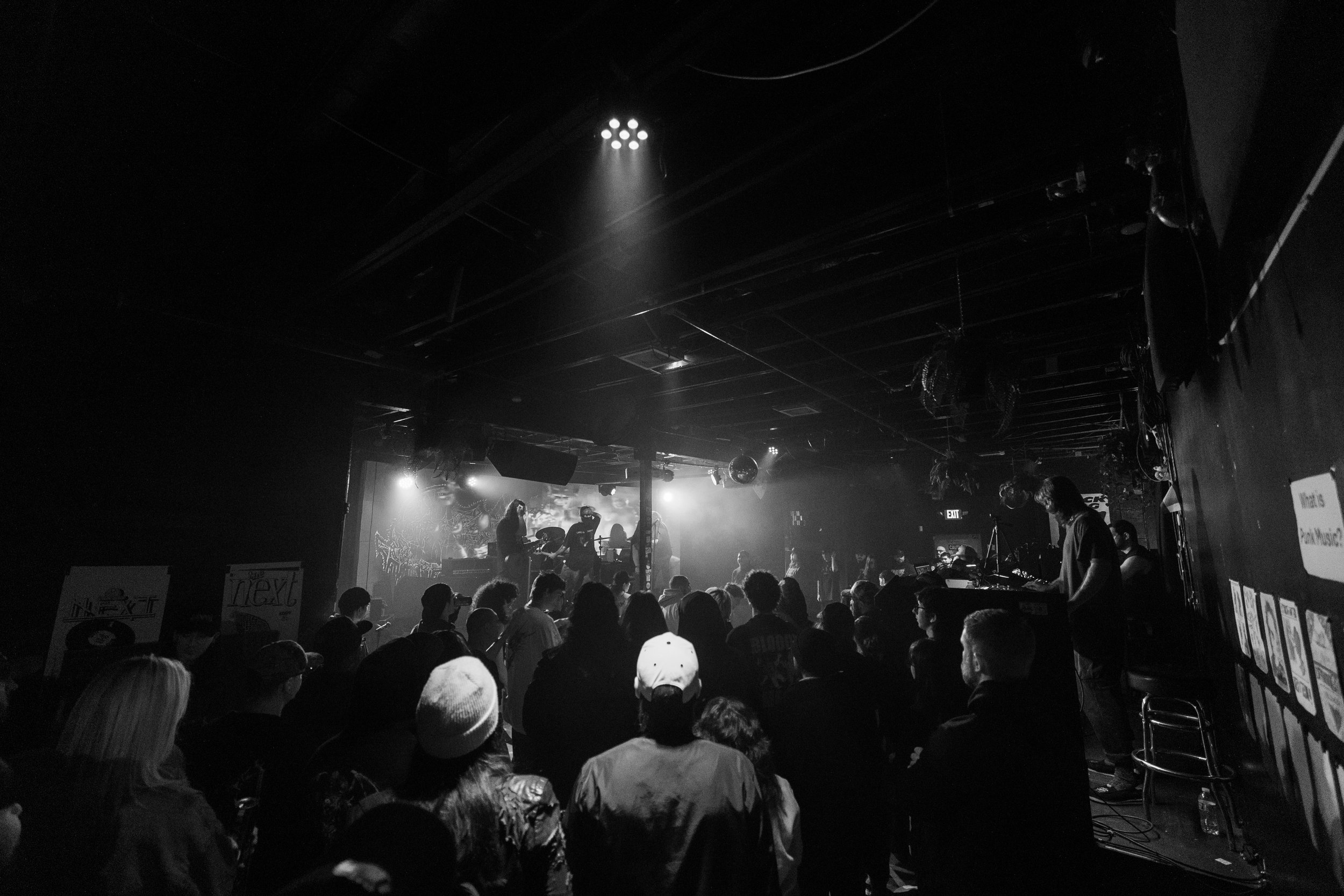  Metal fans tear up the mosh pit as they dance to Boltcutter’s song “Twenty One Cars.” 