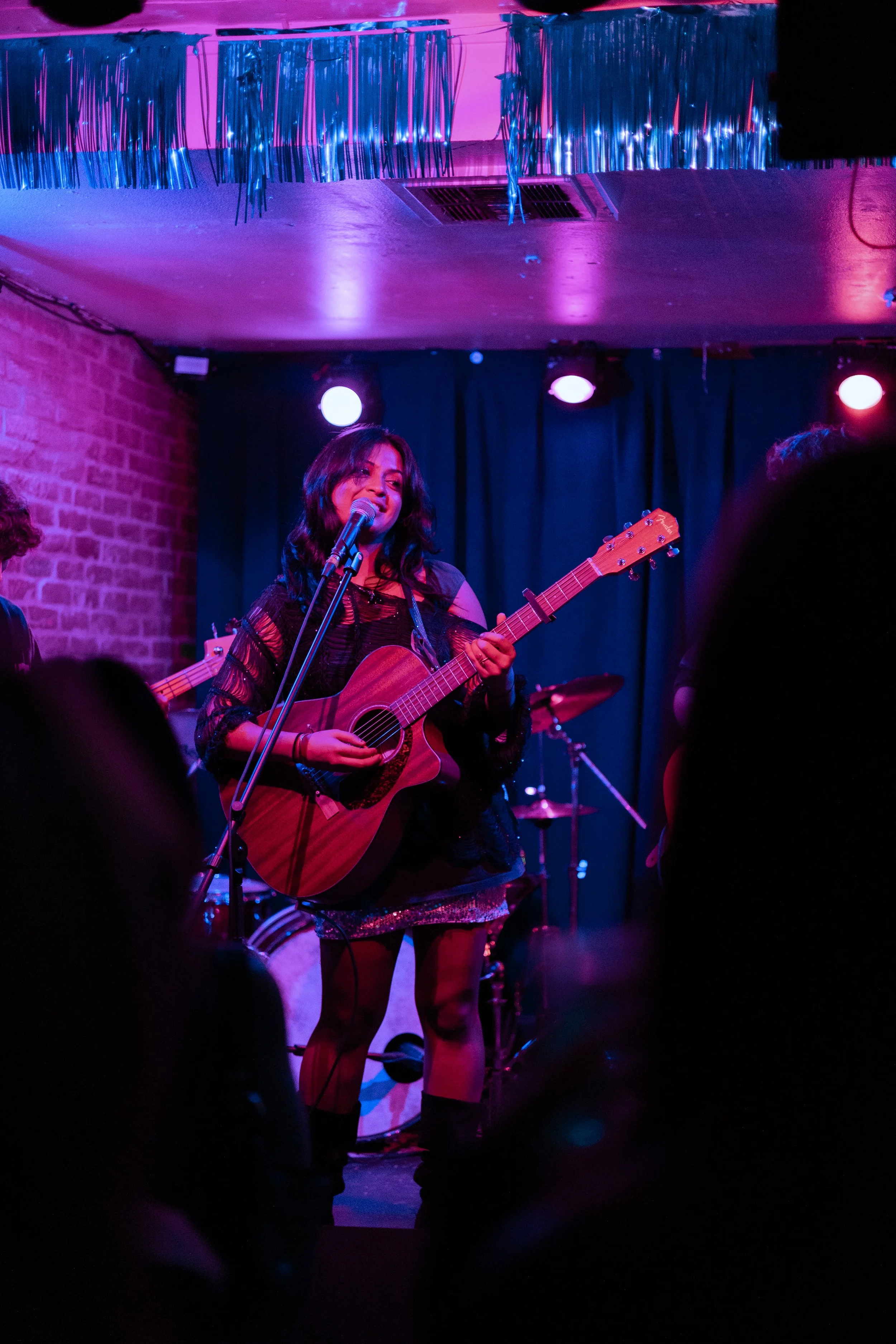  Lead singer Sriyam and her band perform both covers and originals for Afterglow’s Fall 2025 show.  Photo by Ellis Jarvis  