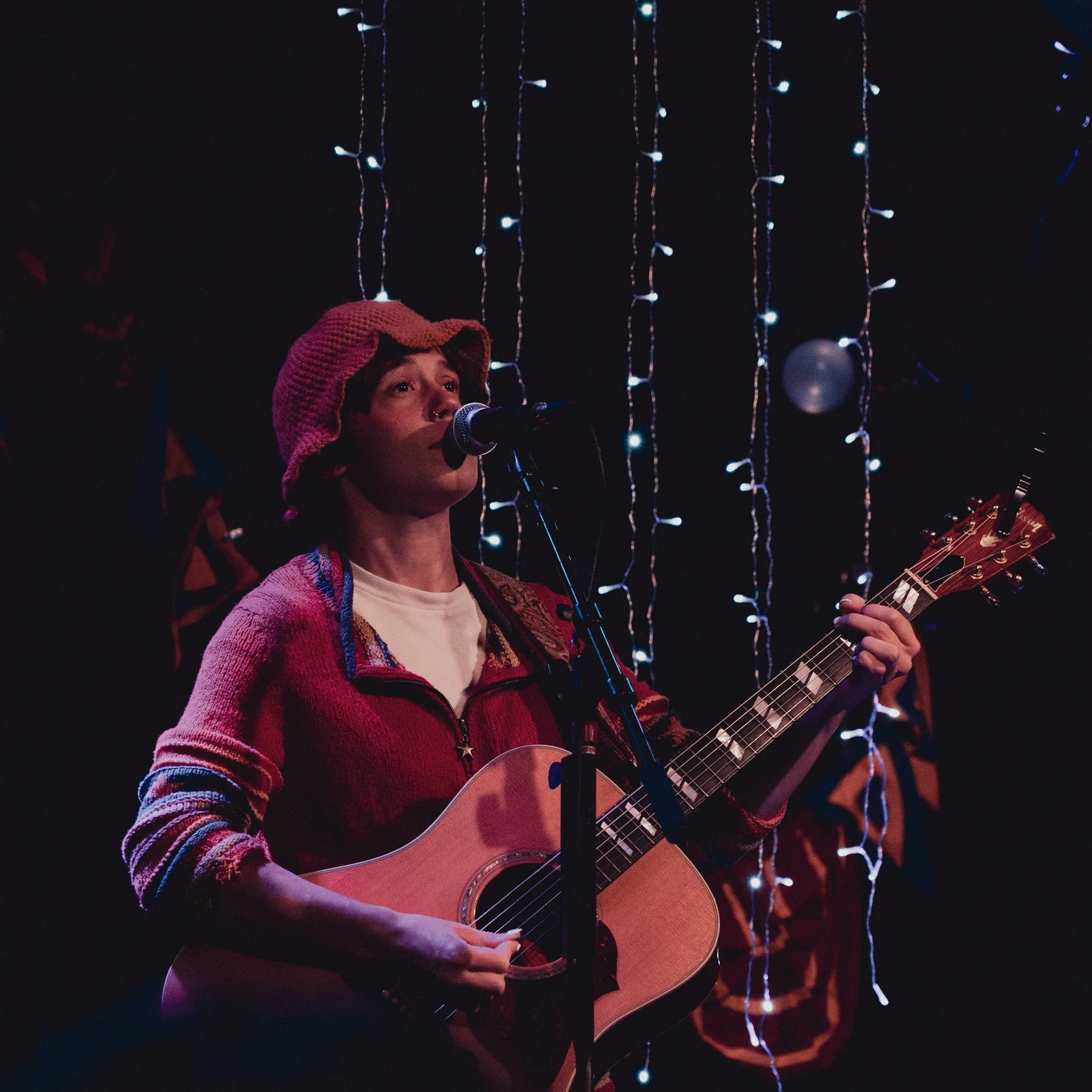  Folk-pop artist Amelia Day opens for Madilyn Mei with an acoustic set filled with songs inspired by mythology, personal relationships, and queerness, including recent single “Lady Los Angeles.” 