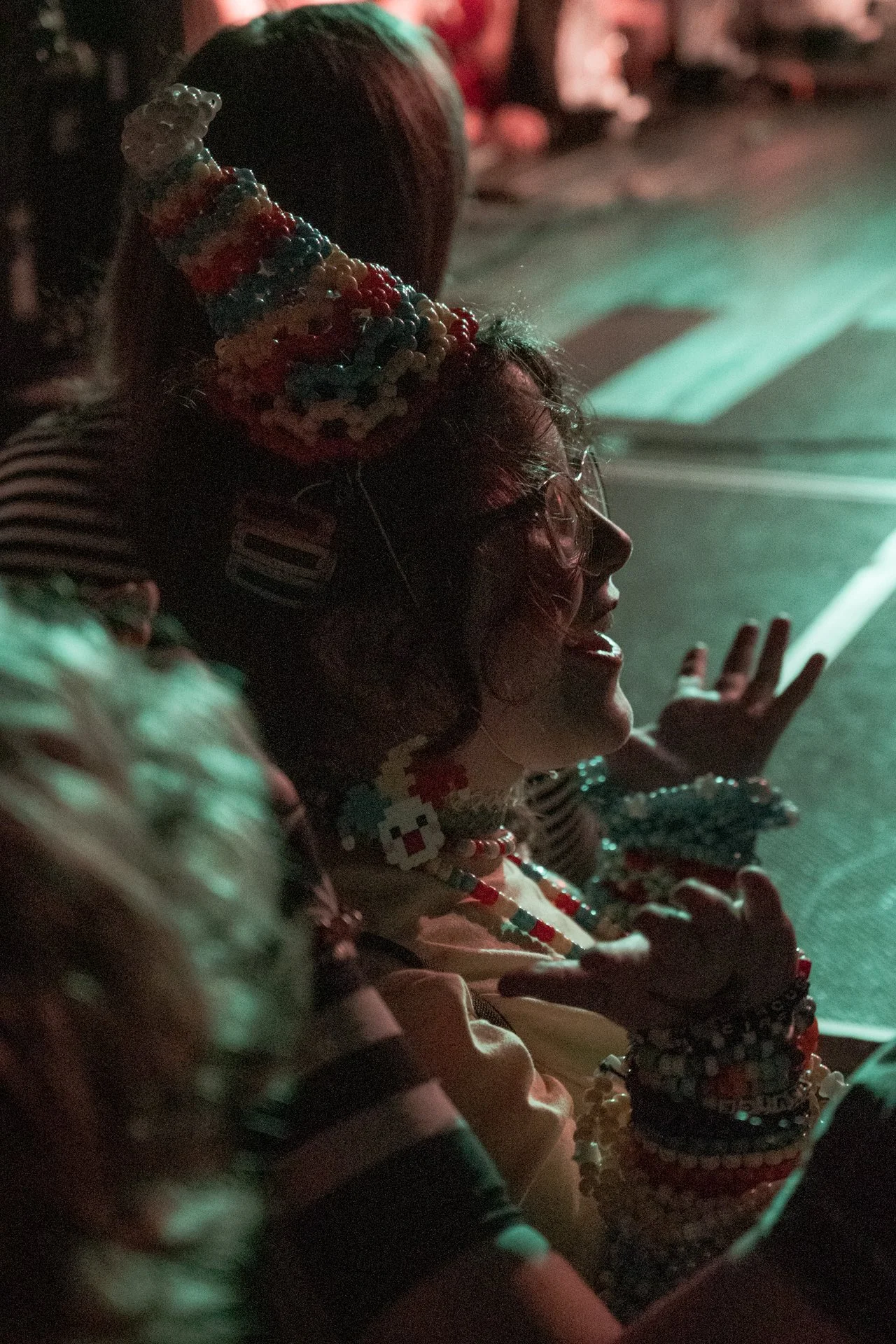  Mei attracts a young audience accessorized with colorful creations like beaded bracelets, eye-catching hats, and patterned pieces. 